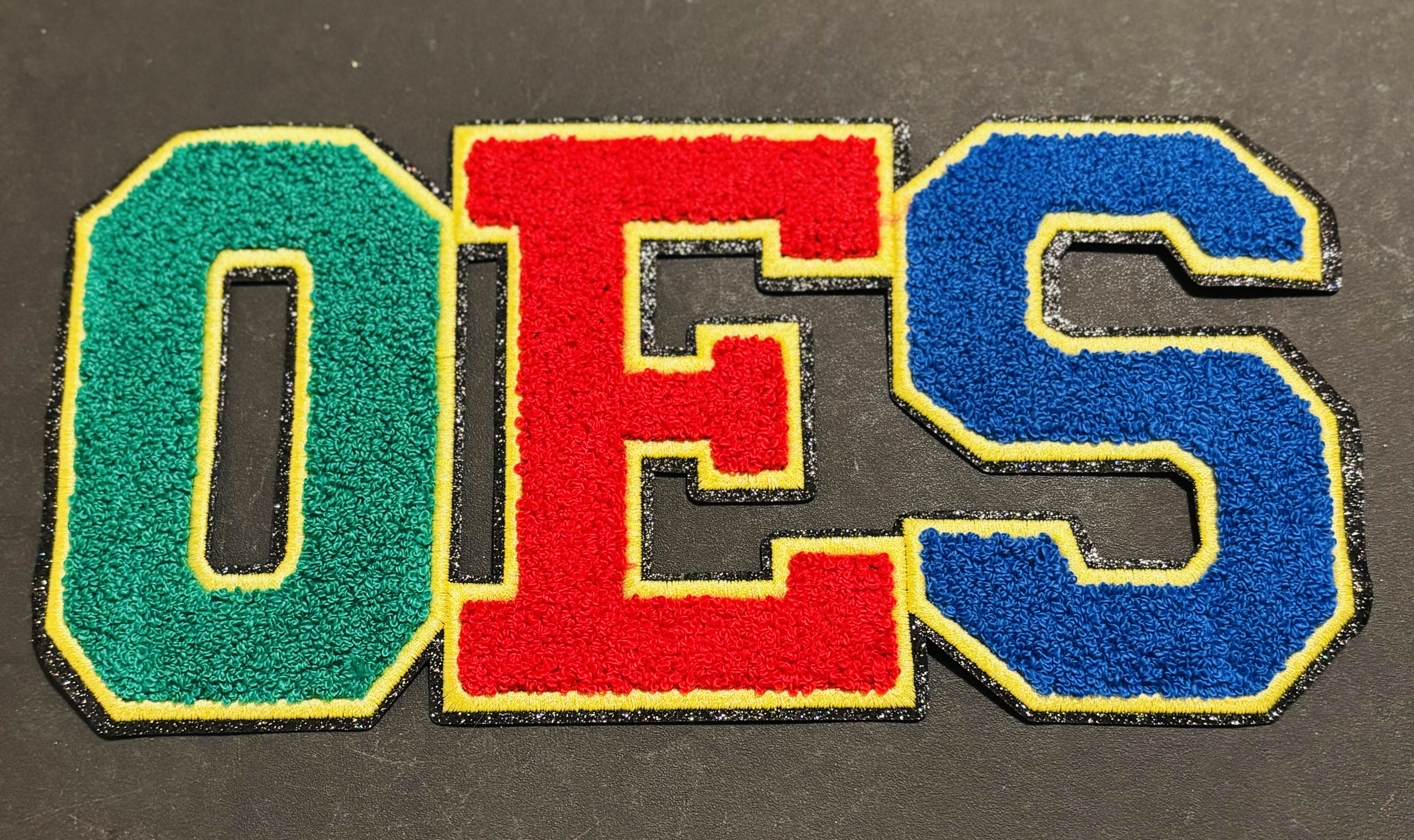 OES with Black Background Iron On Chenille Patch