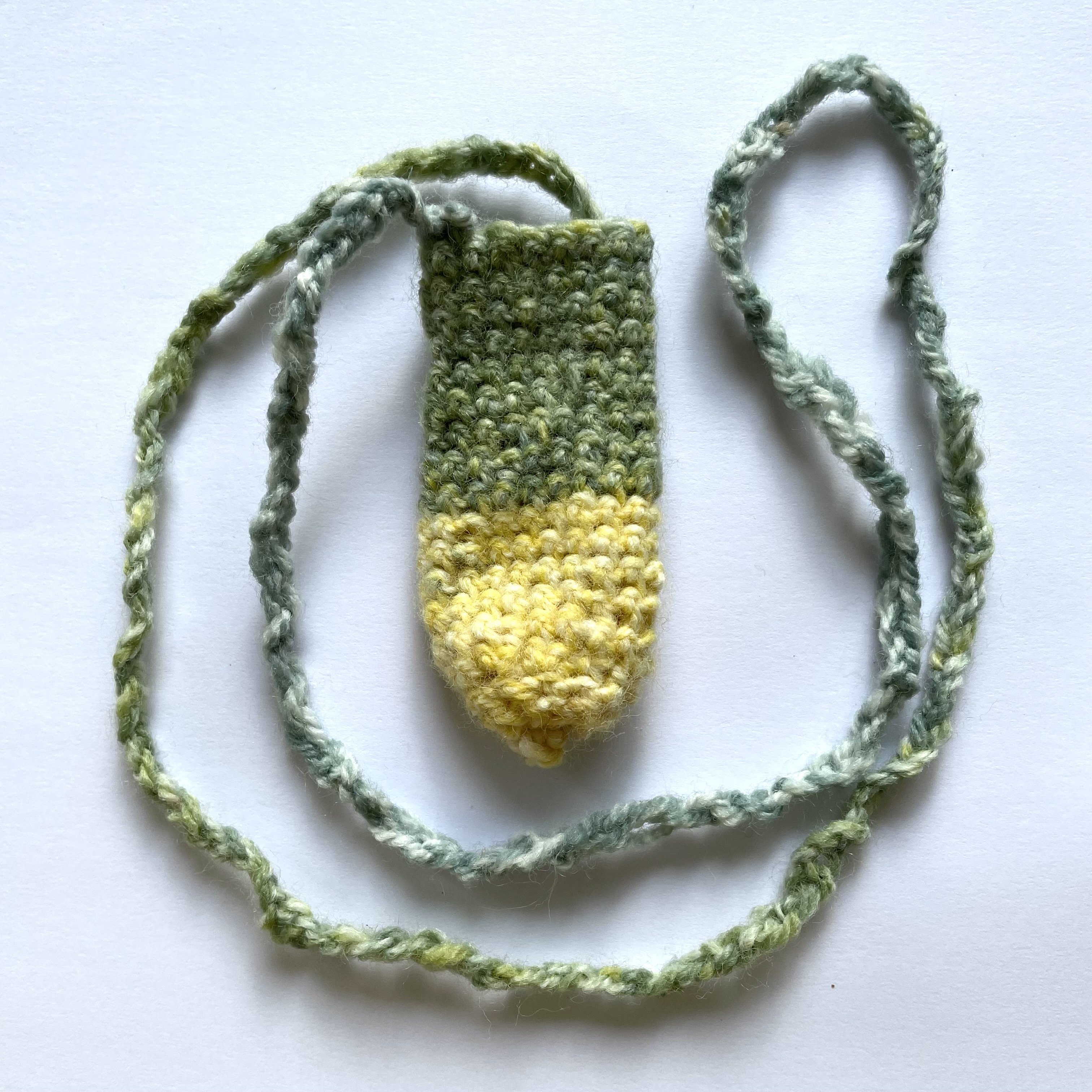 green + yellow lip balm holder