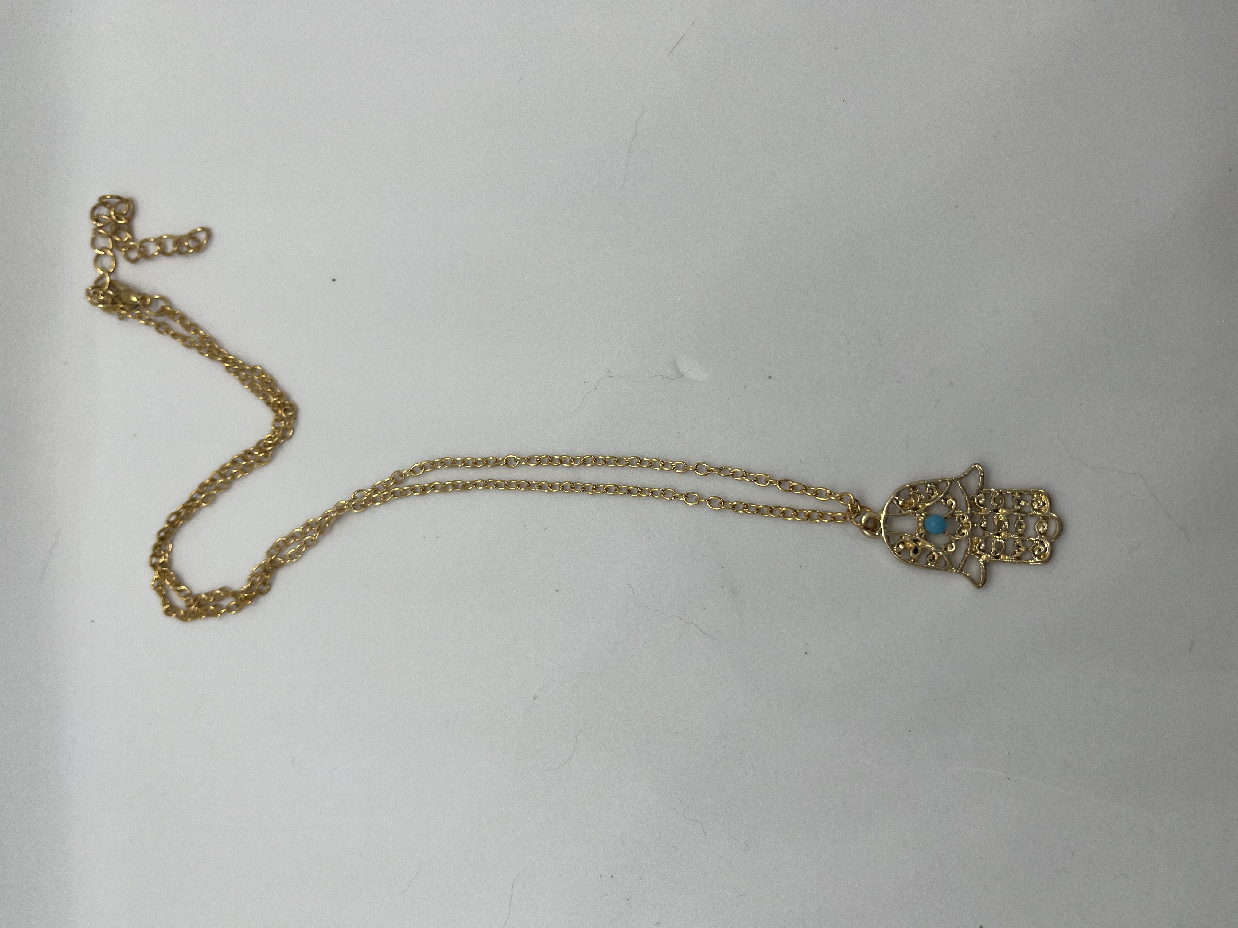 Z Mano de Fatima dorada bisutería