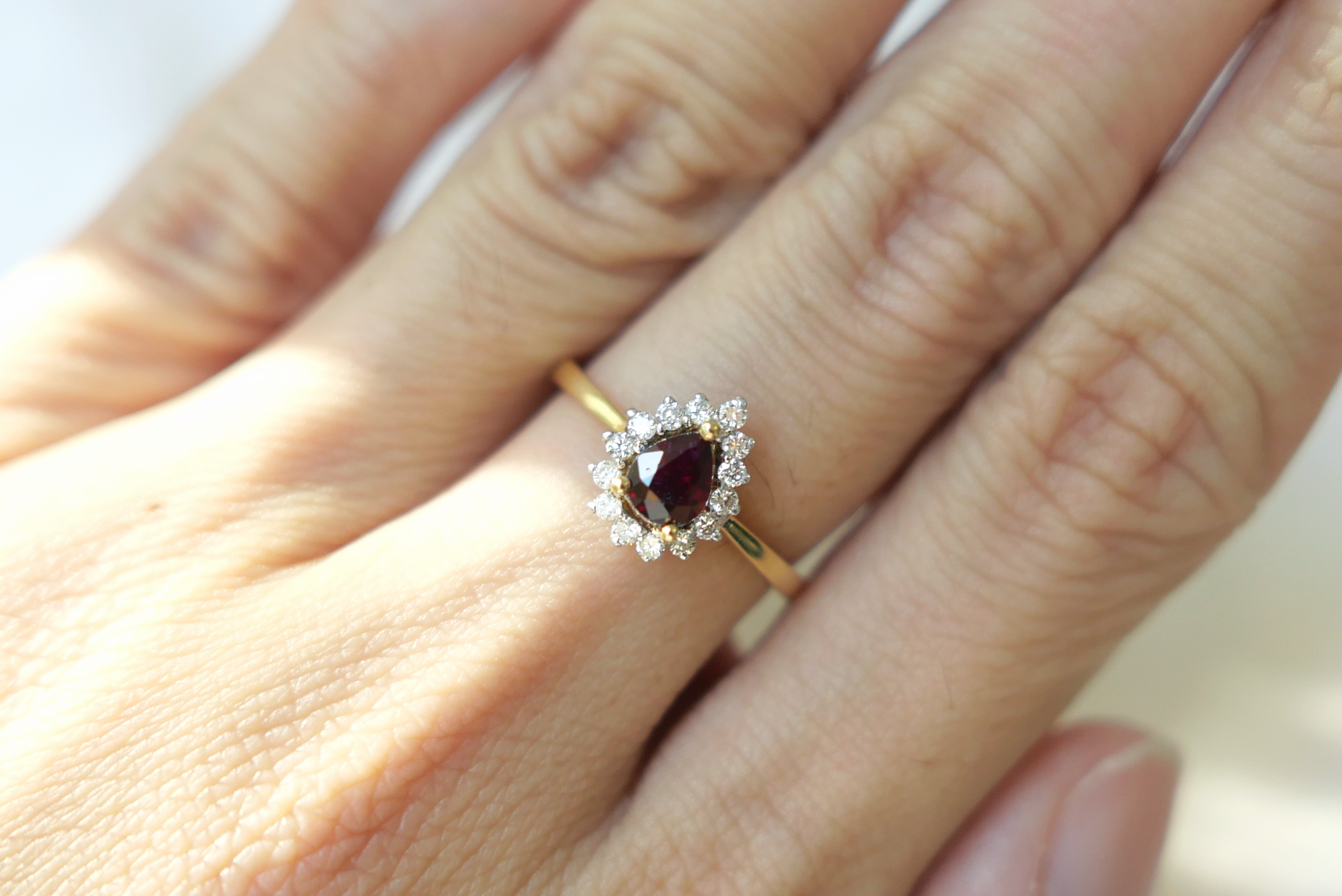 Ruby Ring with Sunburst Halo