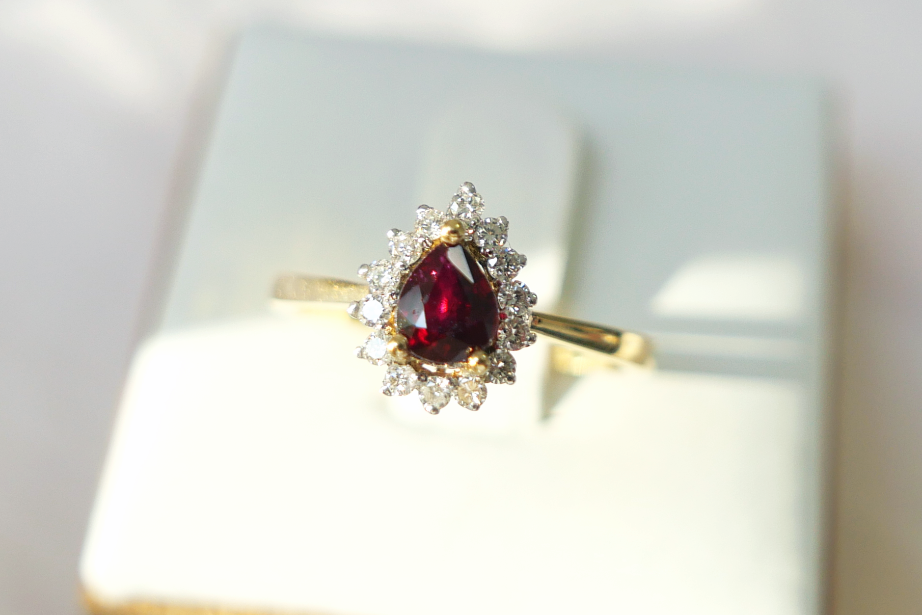 Ruby Ring with Sunburst Halo