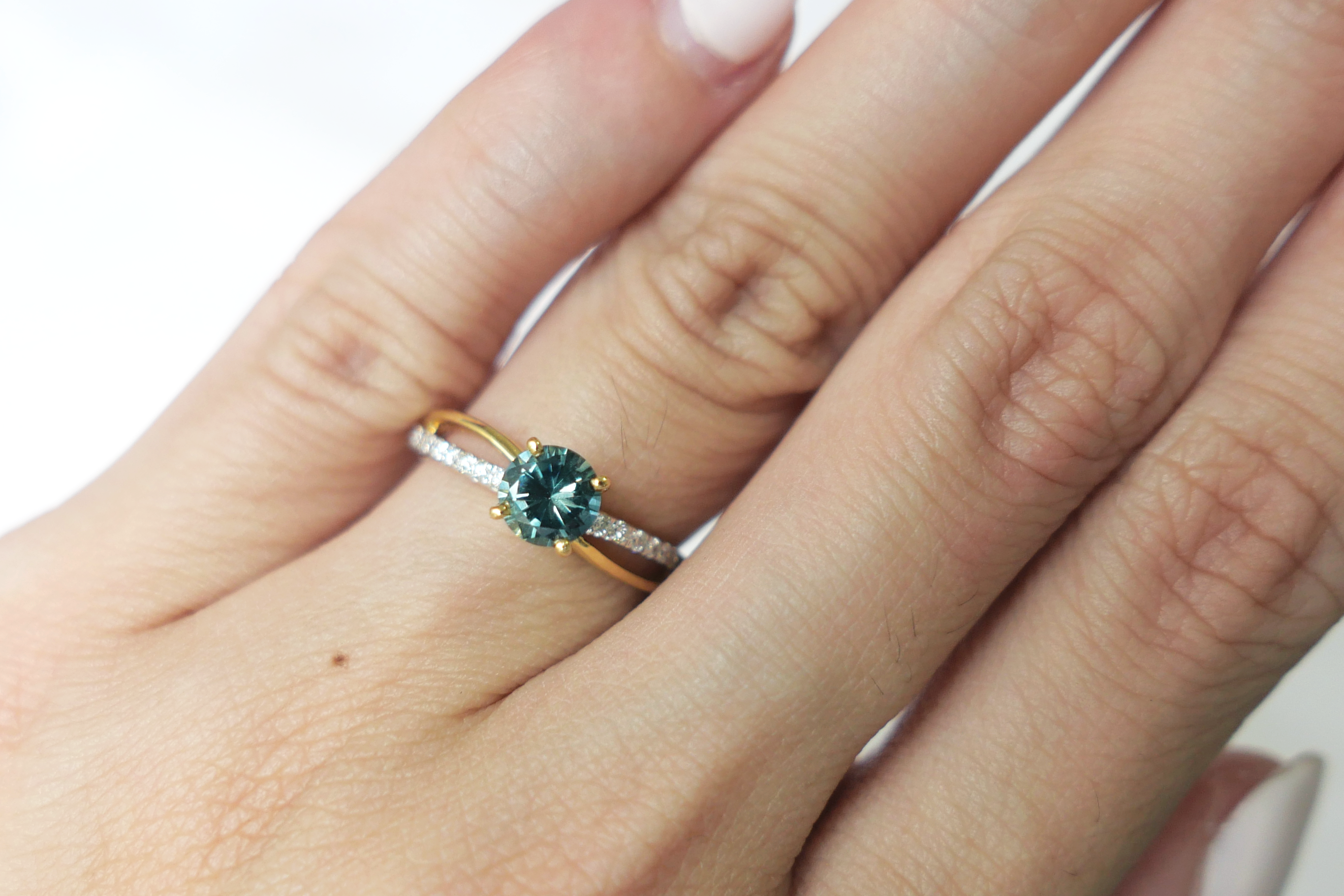 Unheated Teal Sapphire on Twist Diamond Pave Band