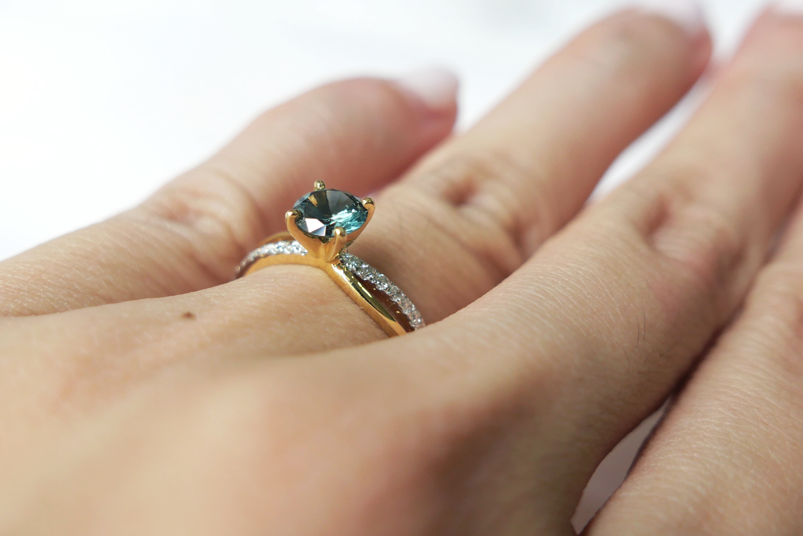 Unheated Teal Sapphire on Twist Diamond Pave Band