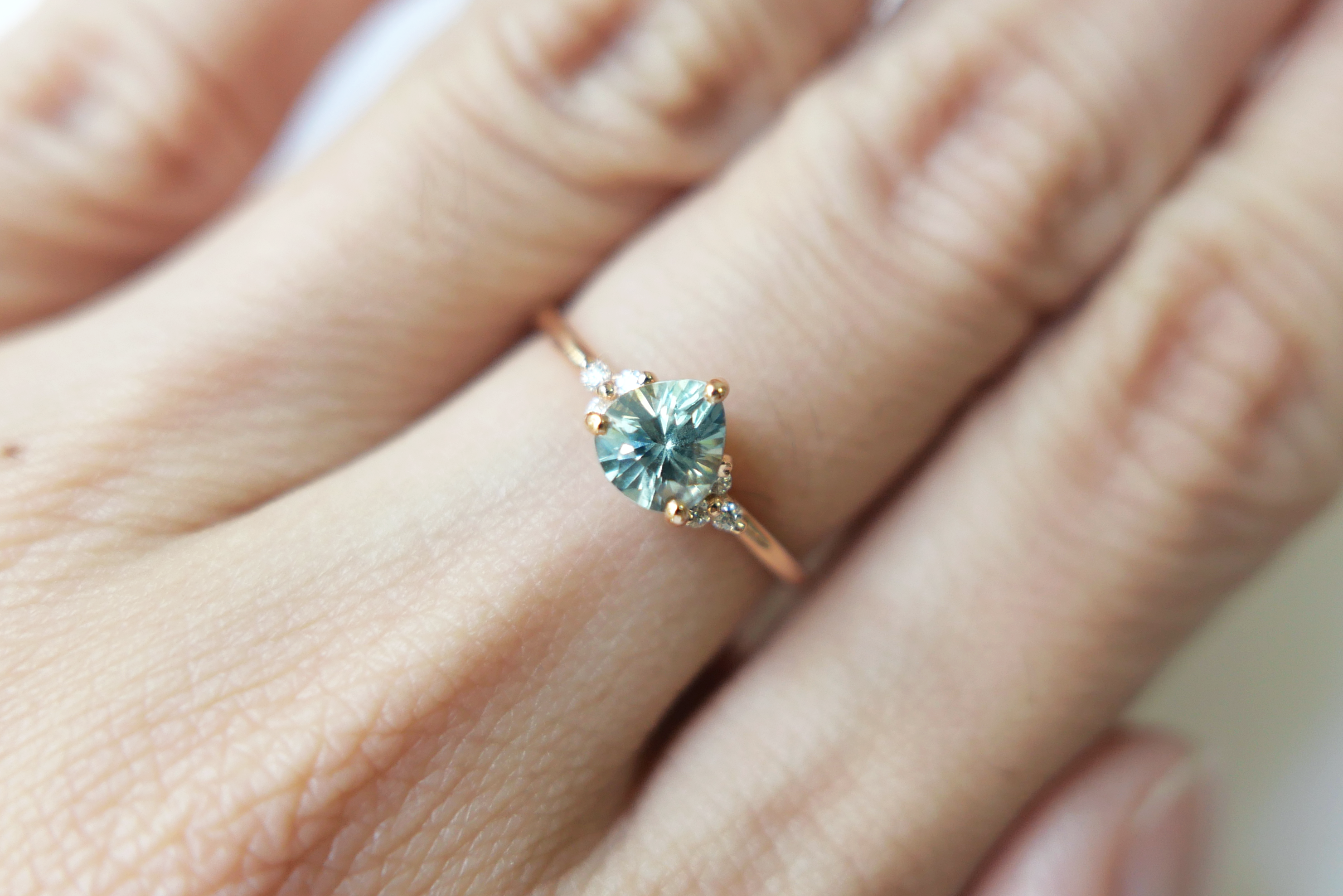 Pear Shaped Sapphire with a Trio of Diamonds