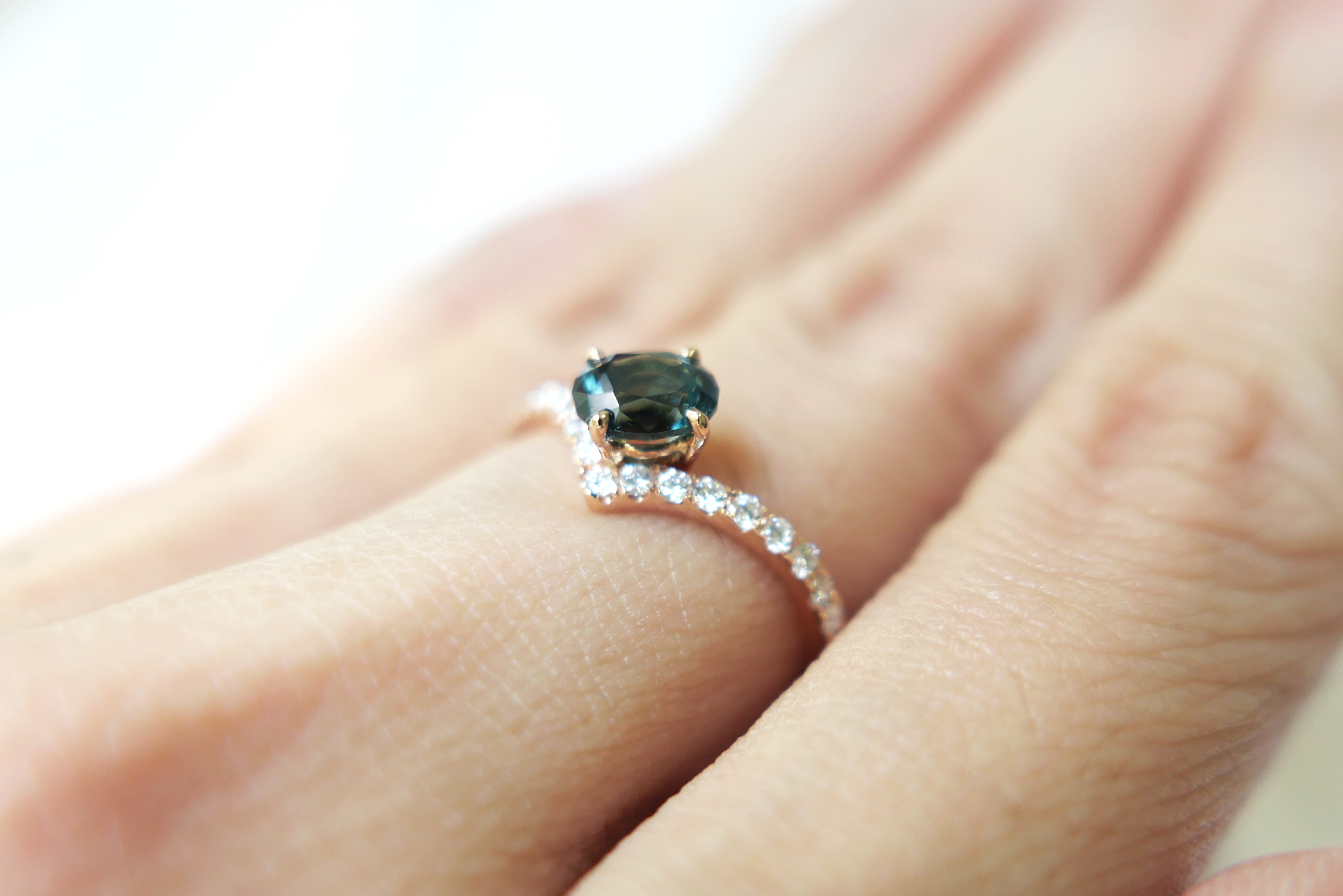 Oval Cut Dark Teal Green Sapphire in Diamond Pave Peak Band Ring