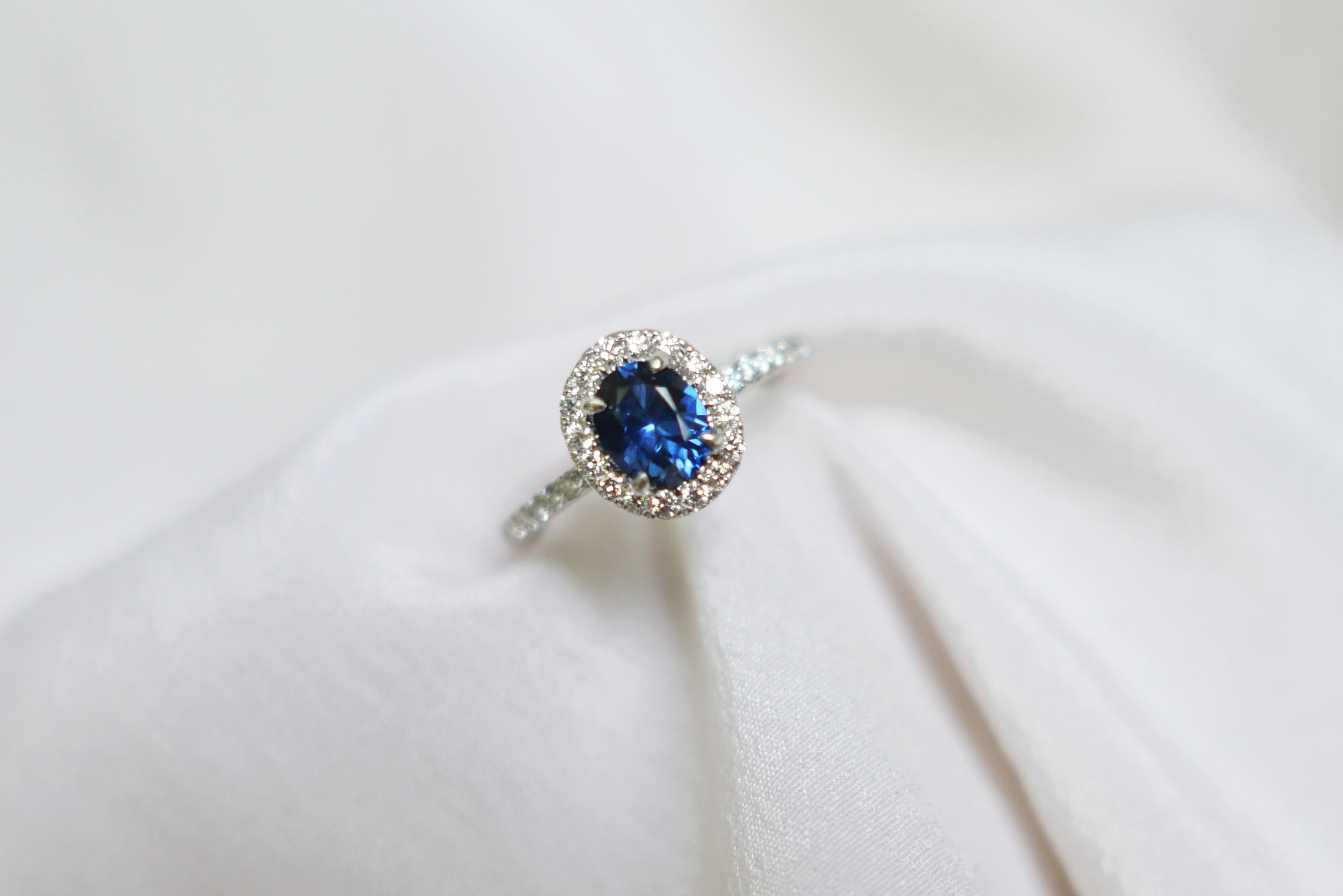 Blue Oval Sapphire with Diamond Halo and Pave Band