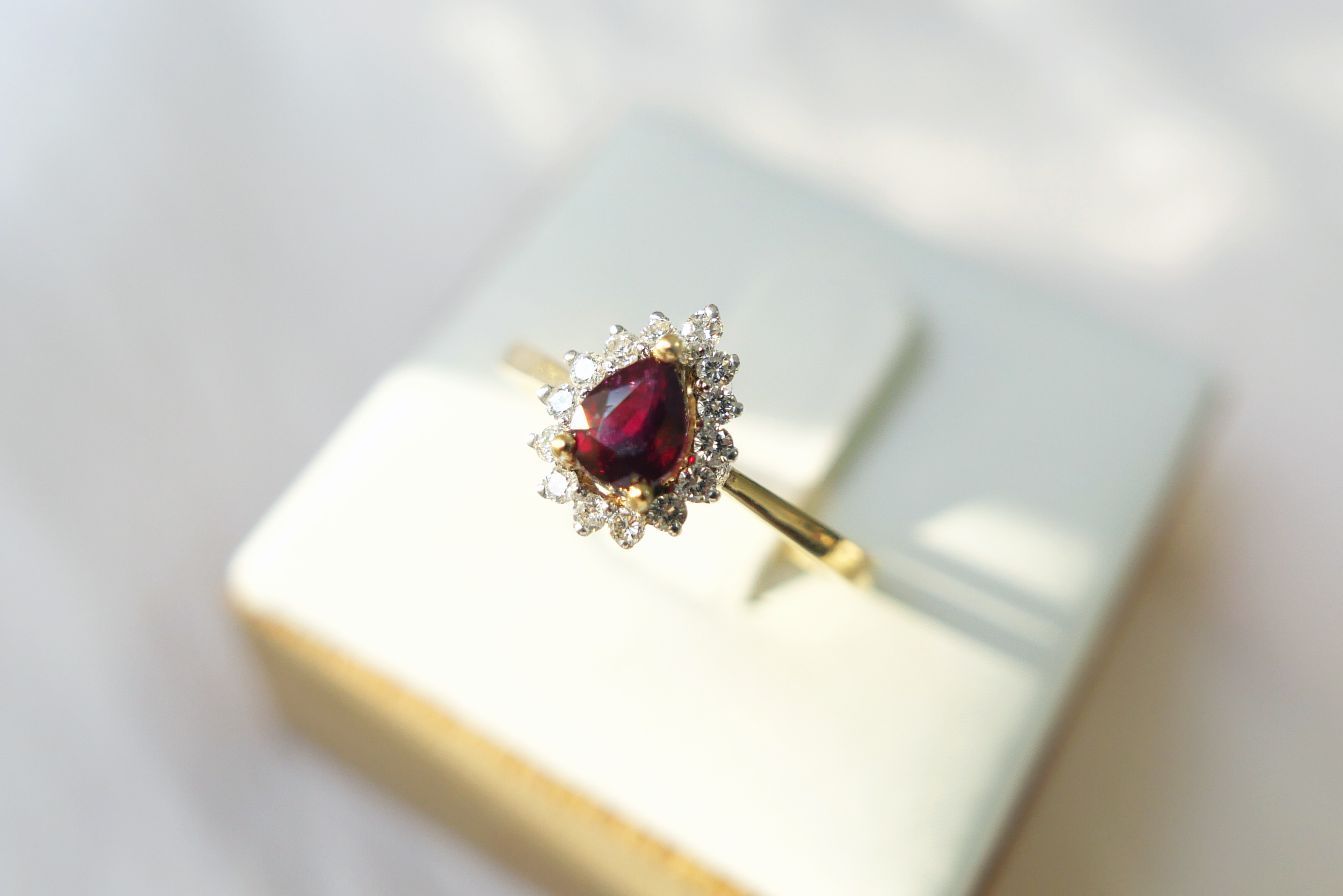 Ruby Ring with Sunburst Halo