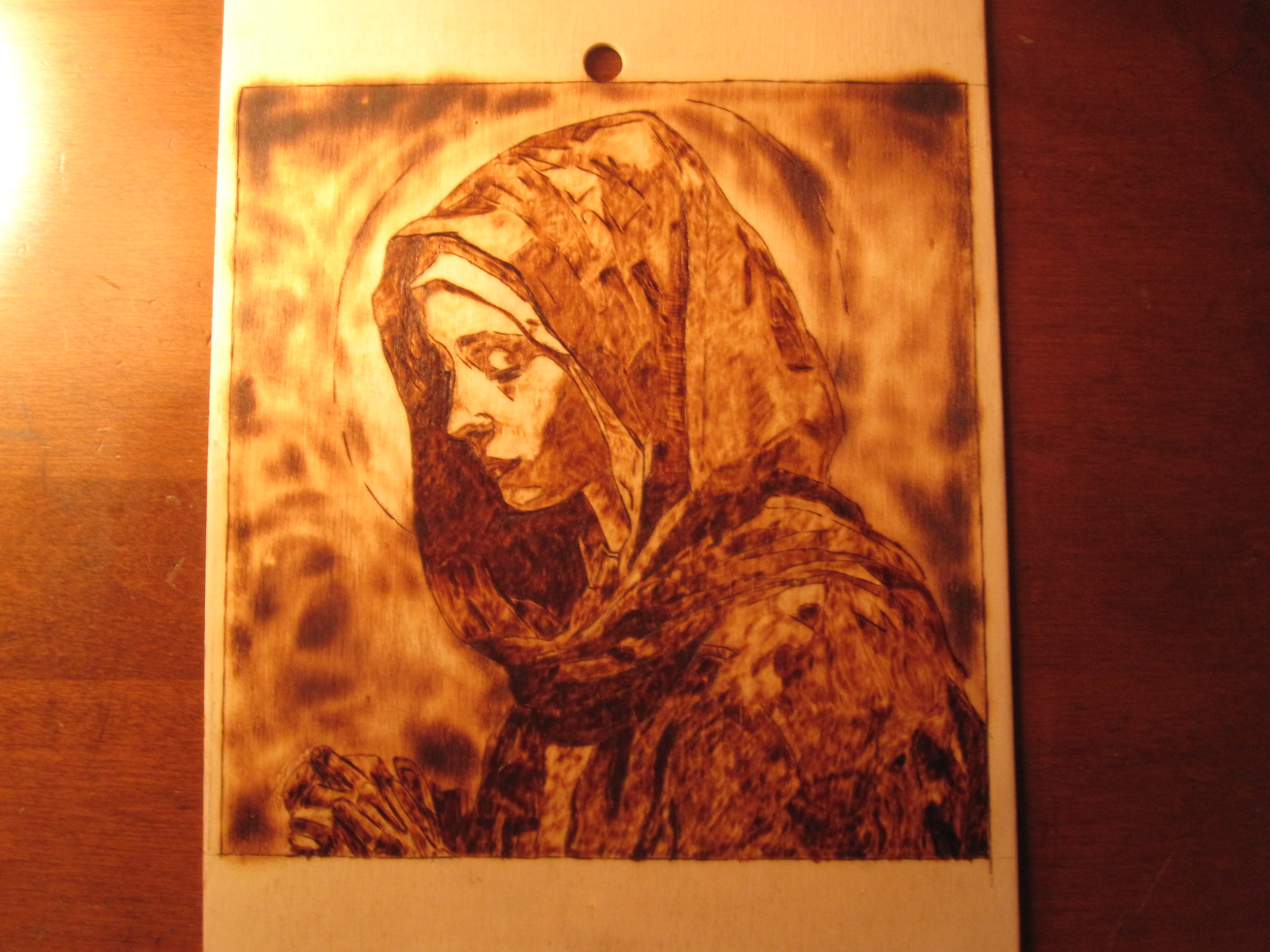 Our Lady woodburned wallhanging