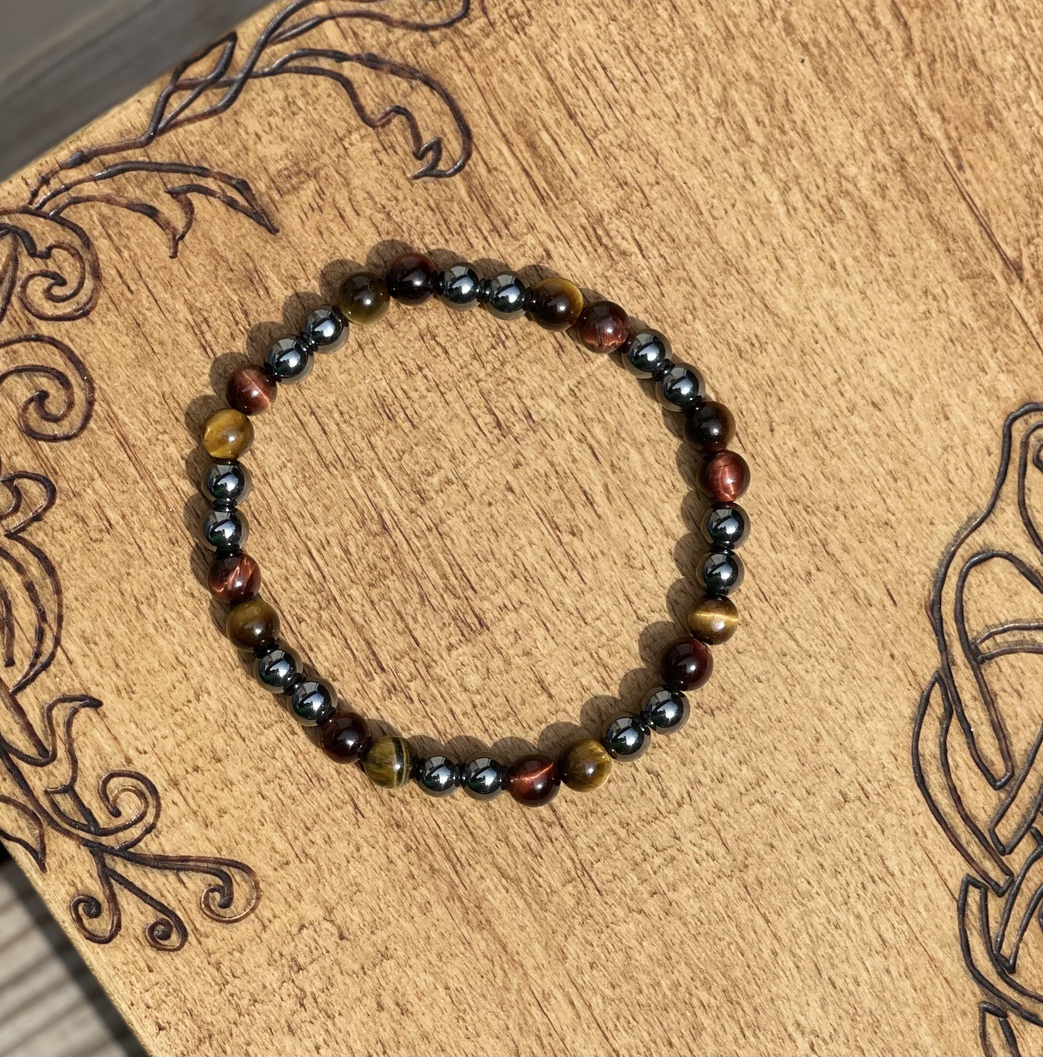Bracelet énergétique en pierres naturelles Oeil de tigre, Oeil de taureau et Hématite