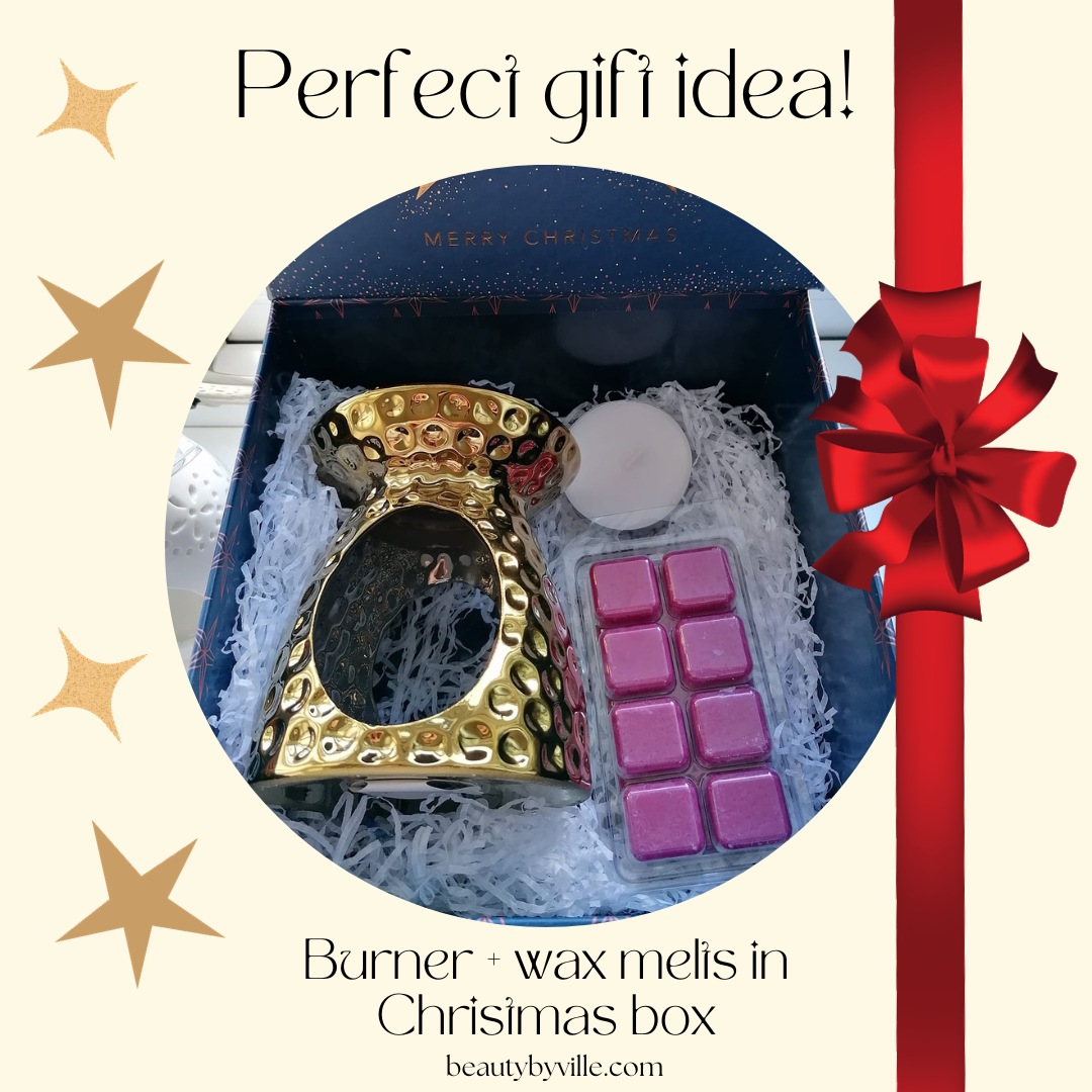 White and gold burner with wax melts and candle