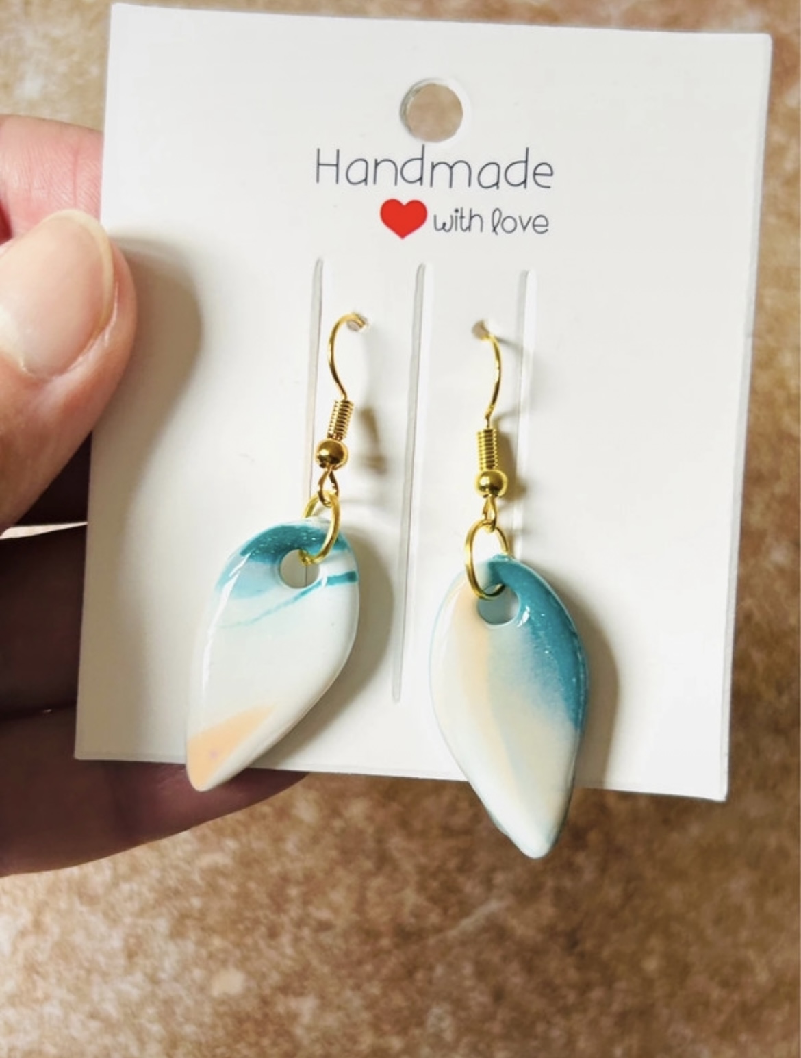 Boucles d'oreilles pendantes " Nudora "