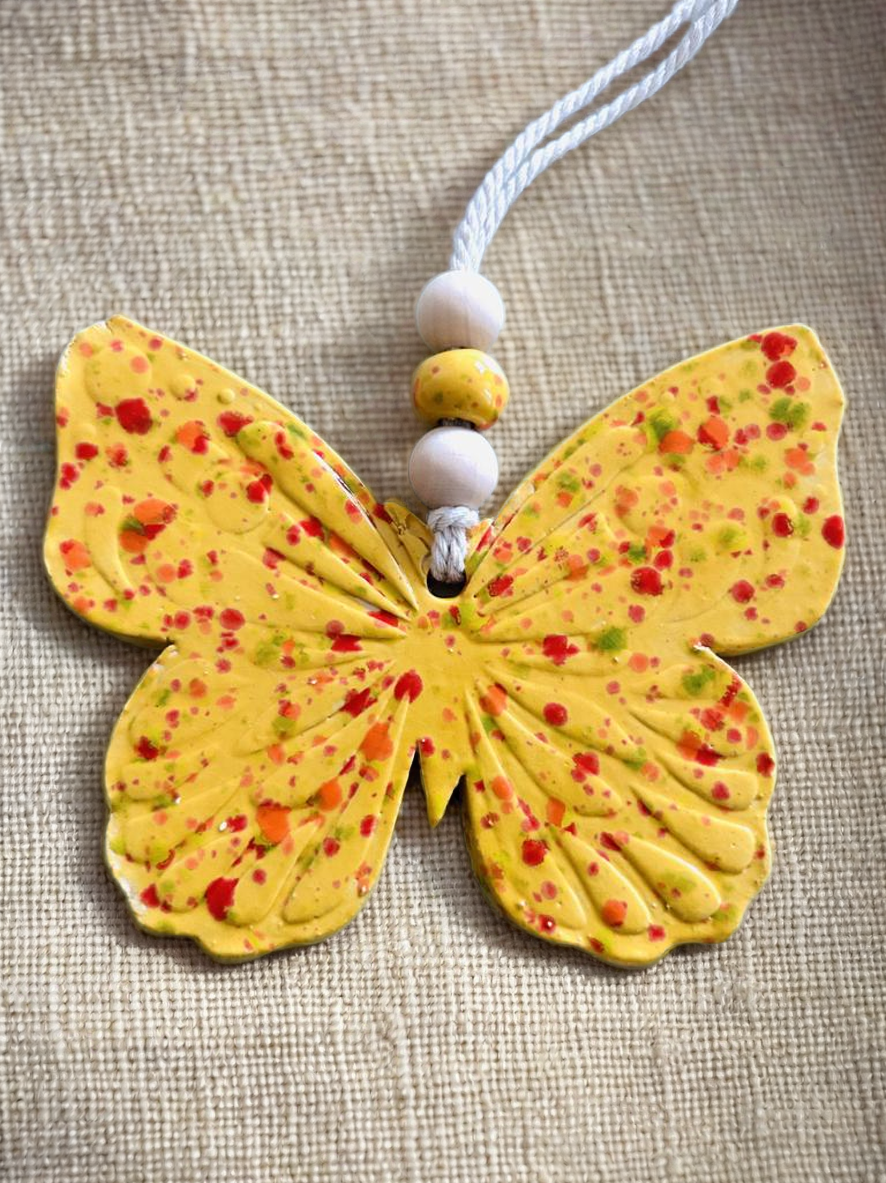 Diffuseur d'huile essentielle forme papillon en céramique jaune doré