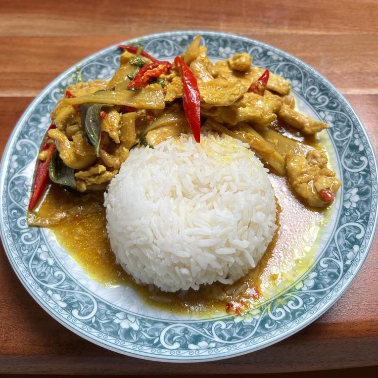 Poulet mit frischem gelbem Chili