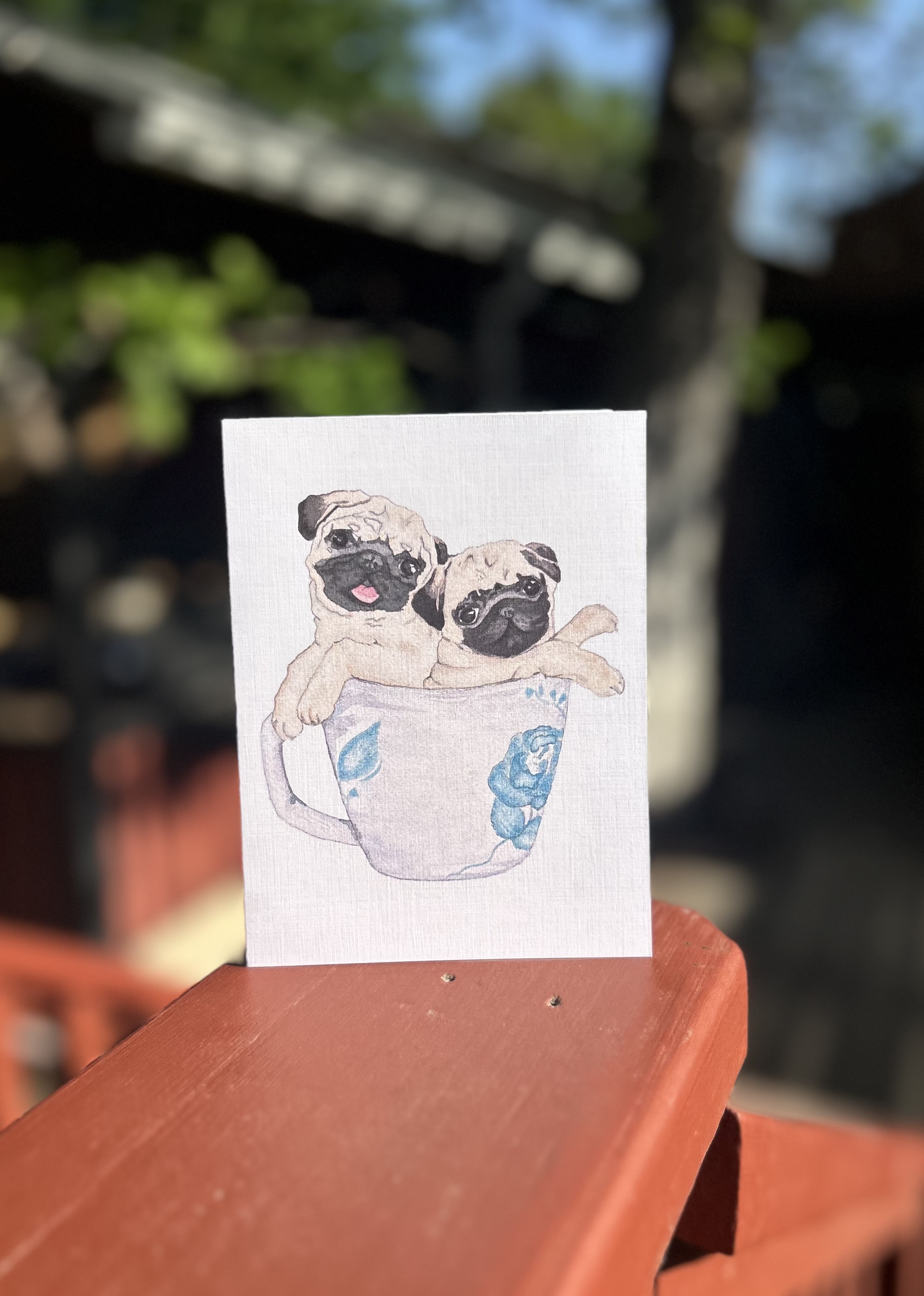 Two Pugs in a Mug greeting card