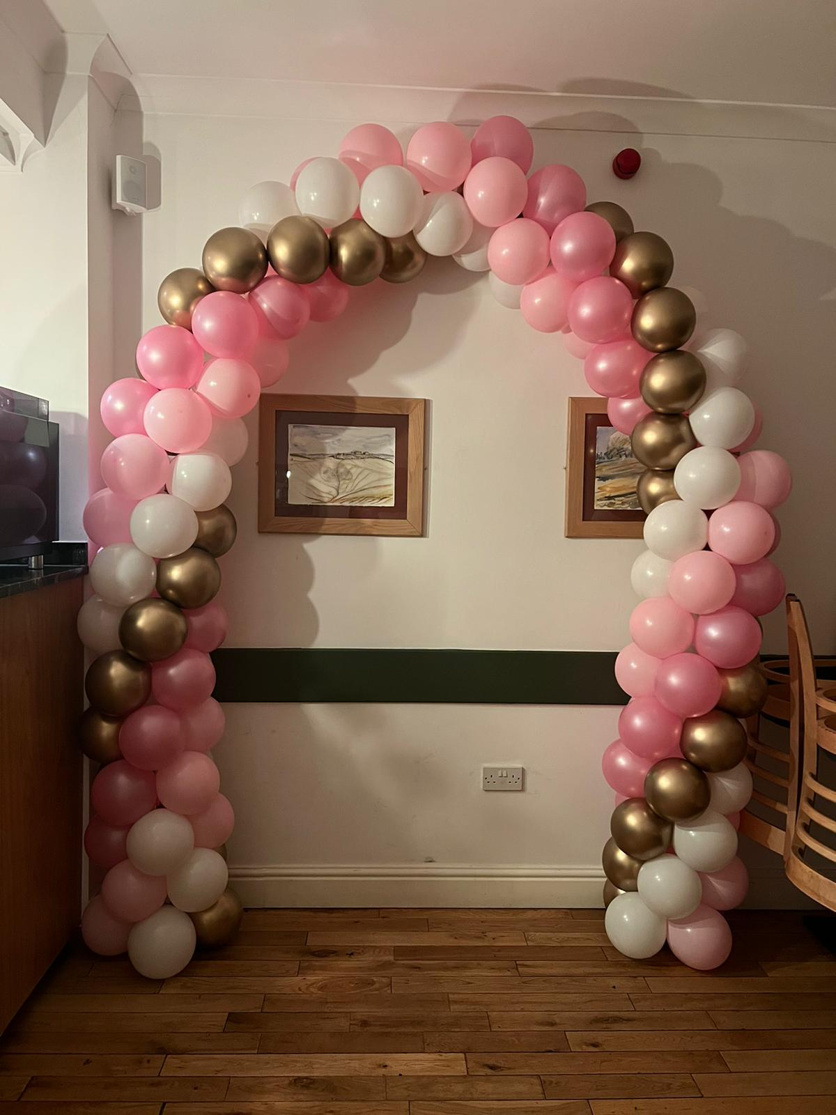 Spiral Balloon Arch (Indoors) in Pink, White and Gold colours
