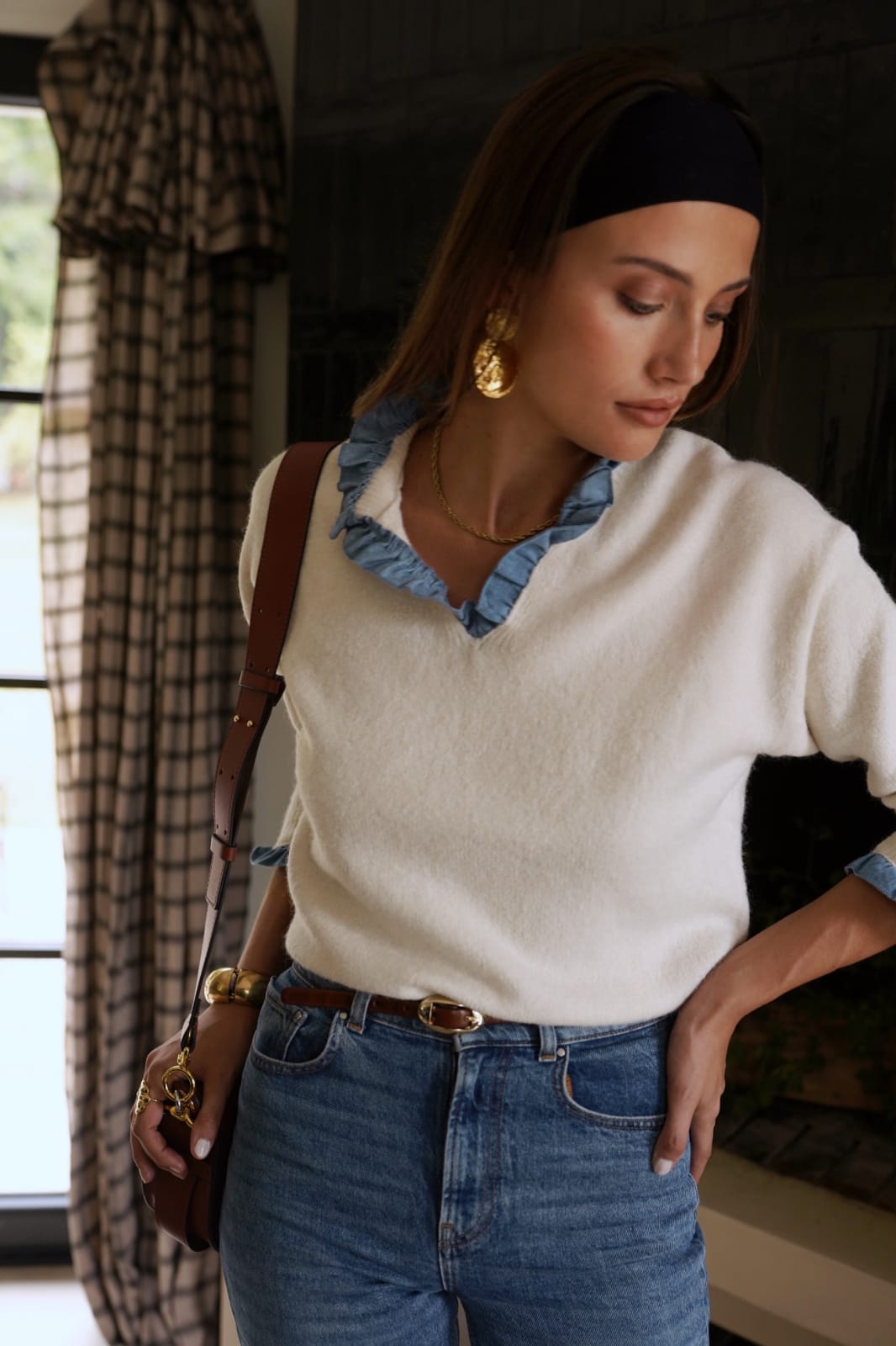 Pull en blanc et jeans