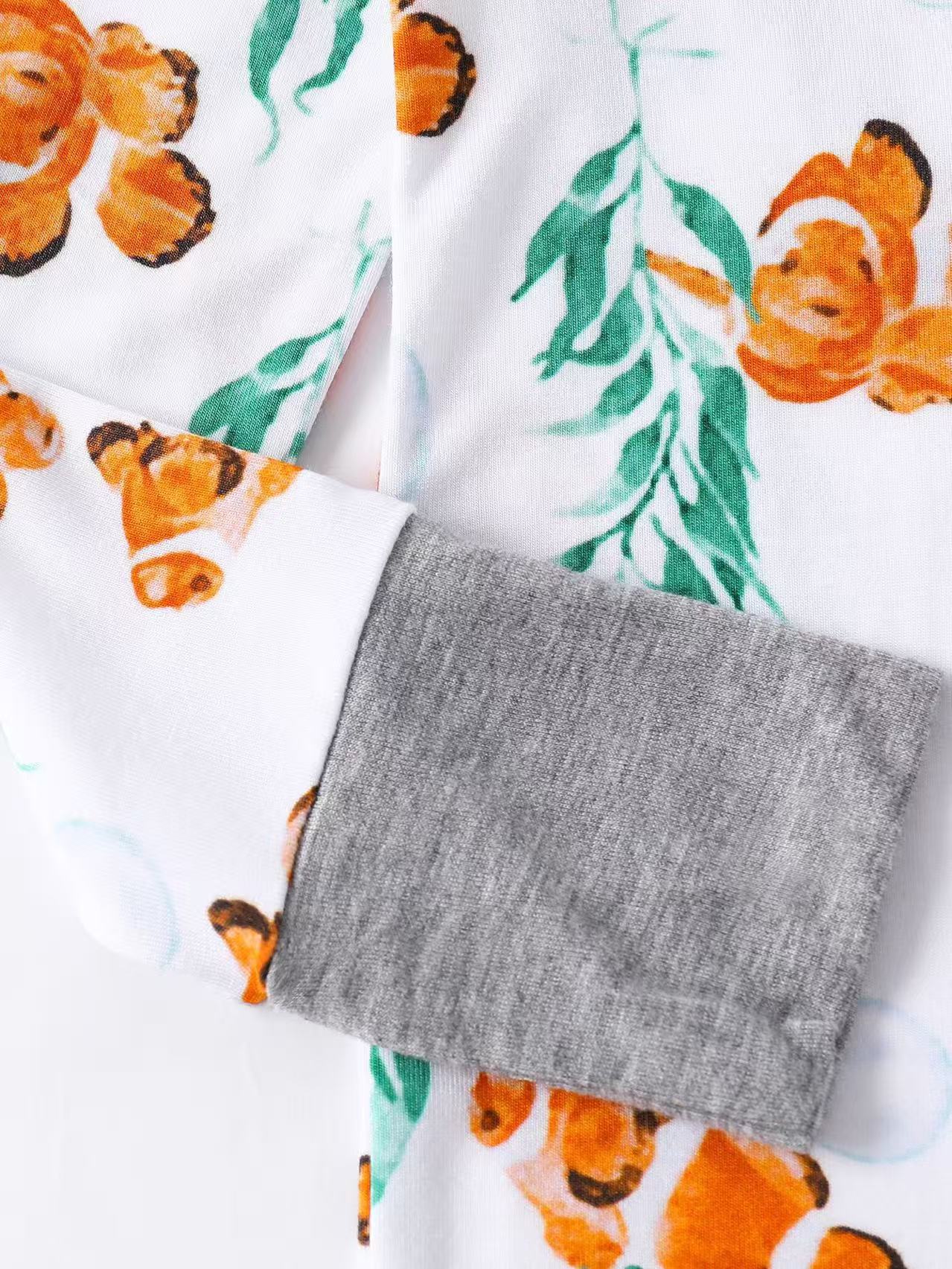 Baby romper with clownfish print