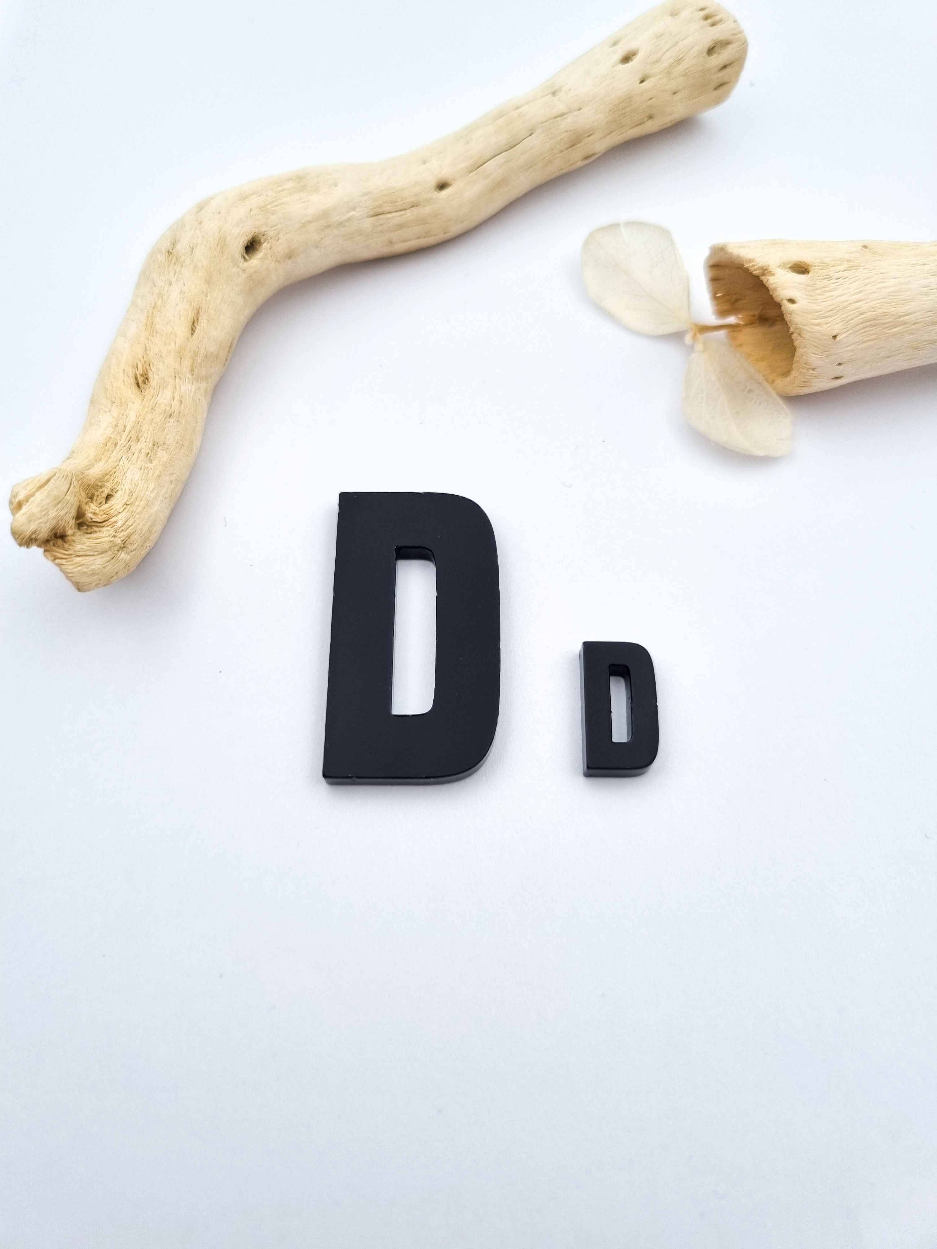 „D“