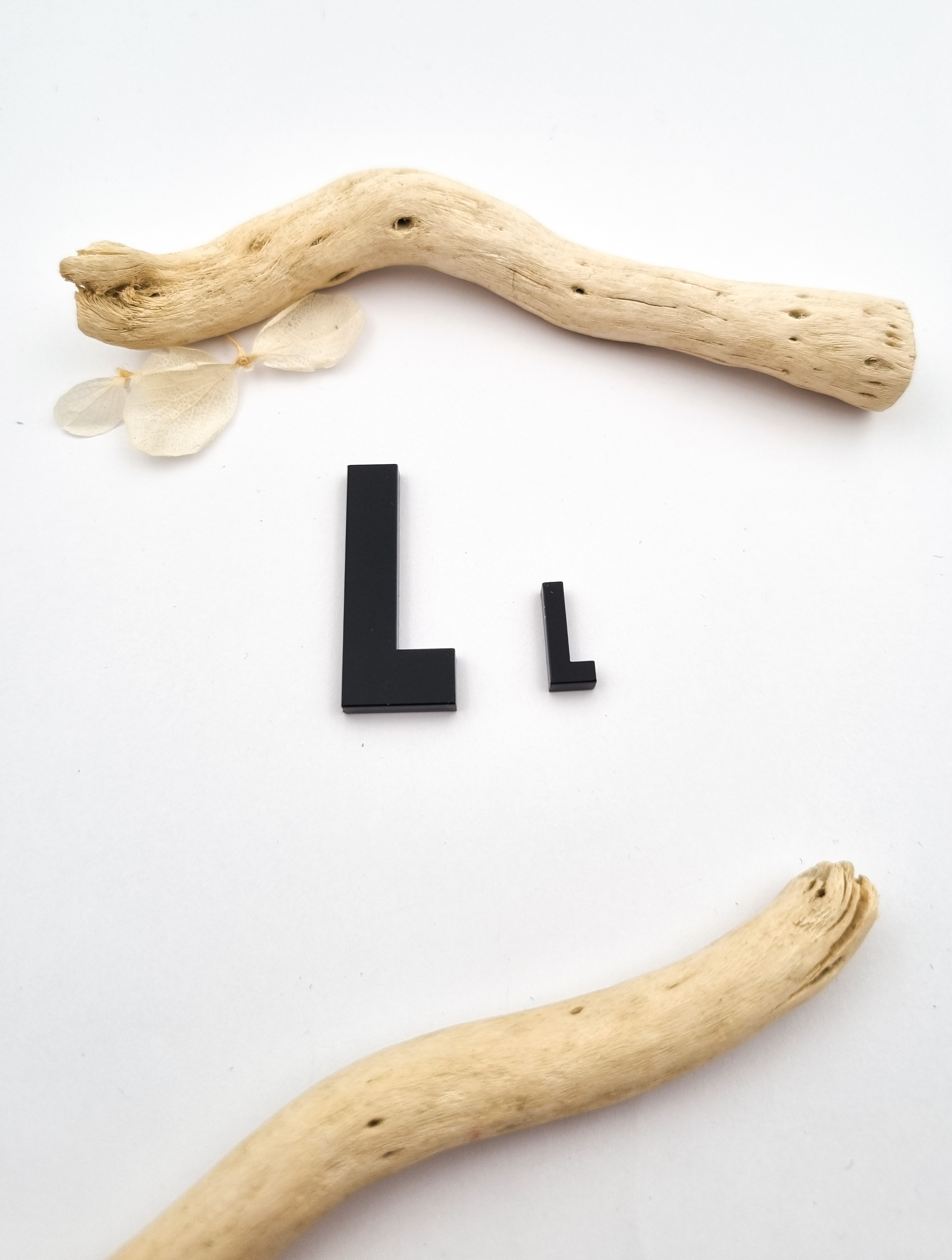 „L“