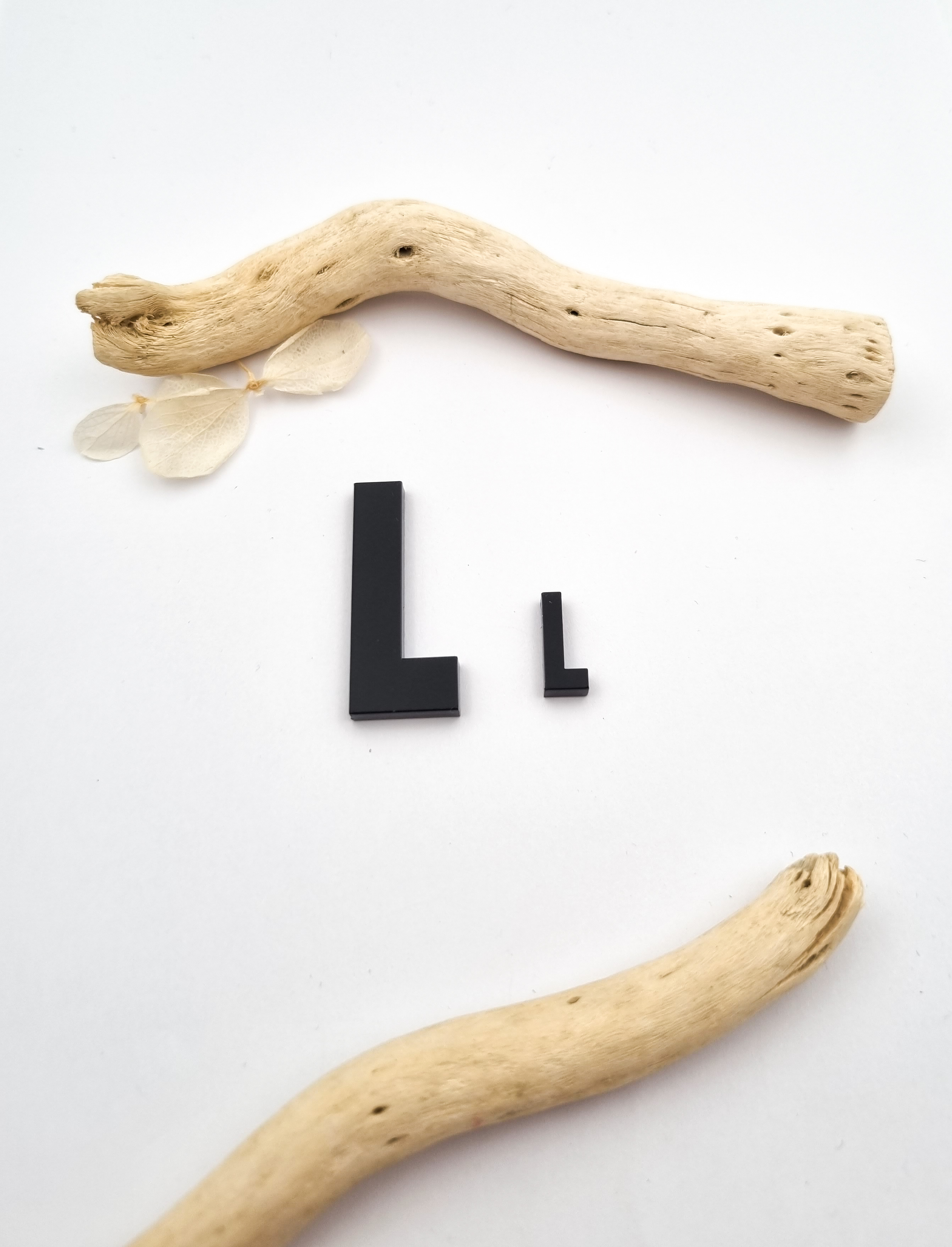 „L“