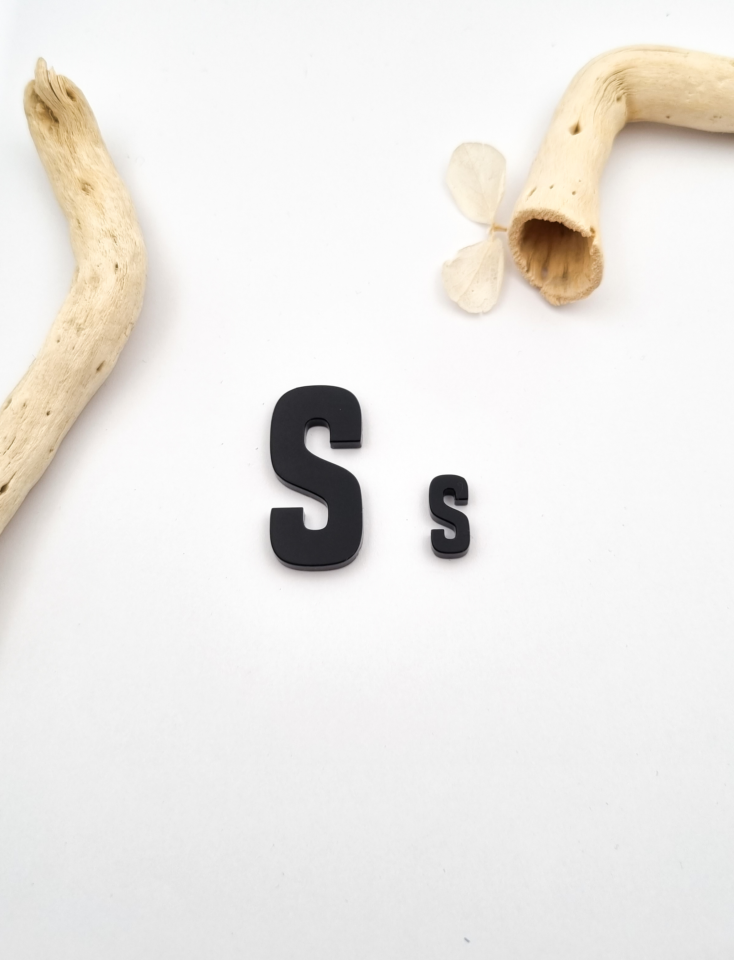 „S“