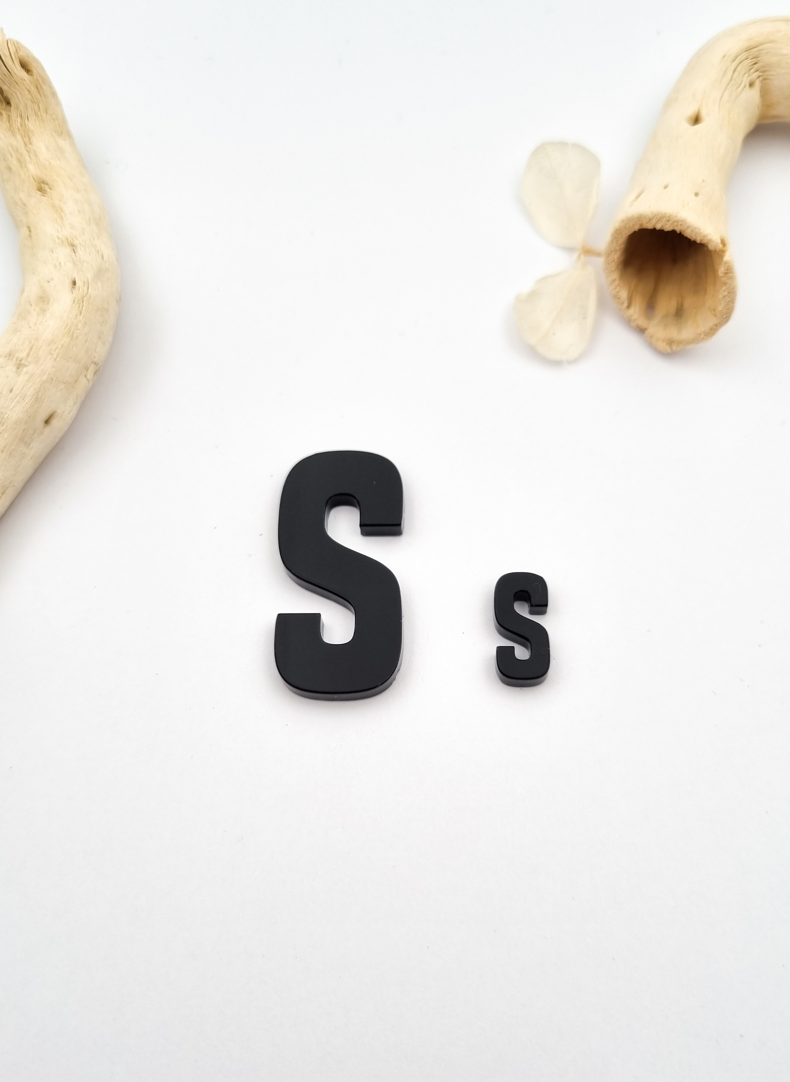 „S“