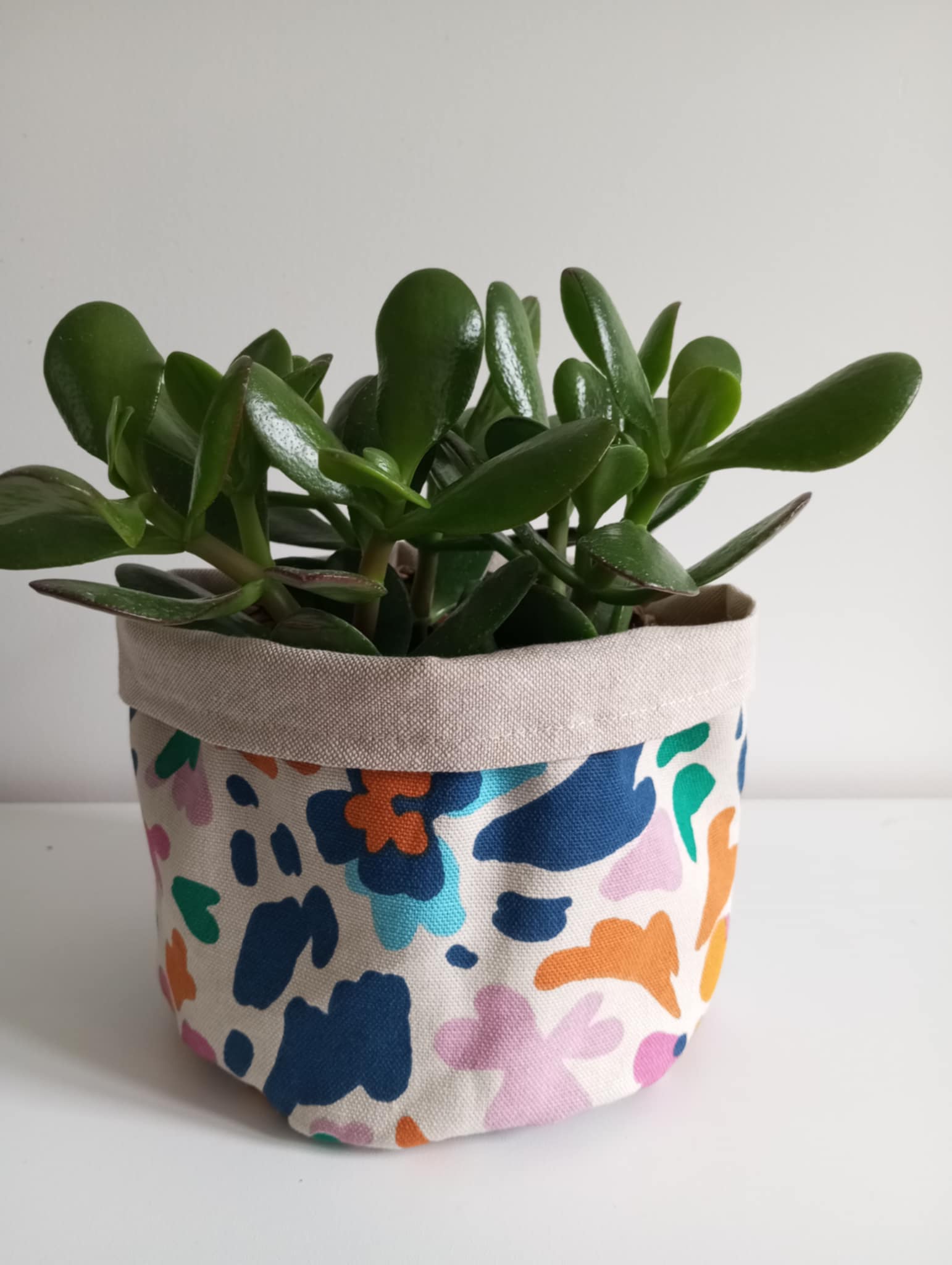 Cache-pot en tissu motif fleuri
