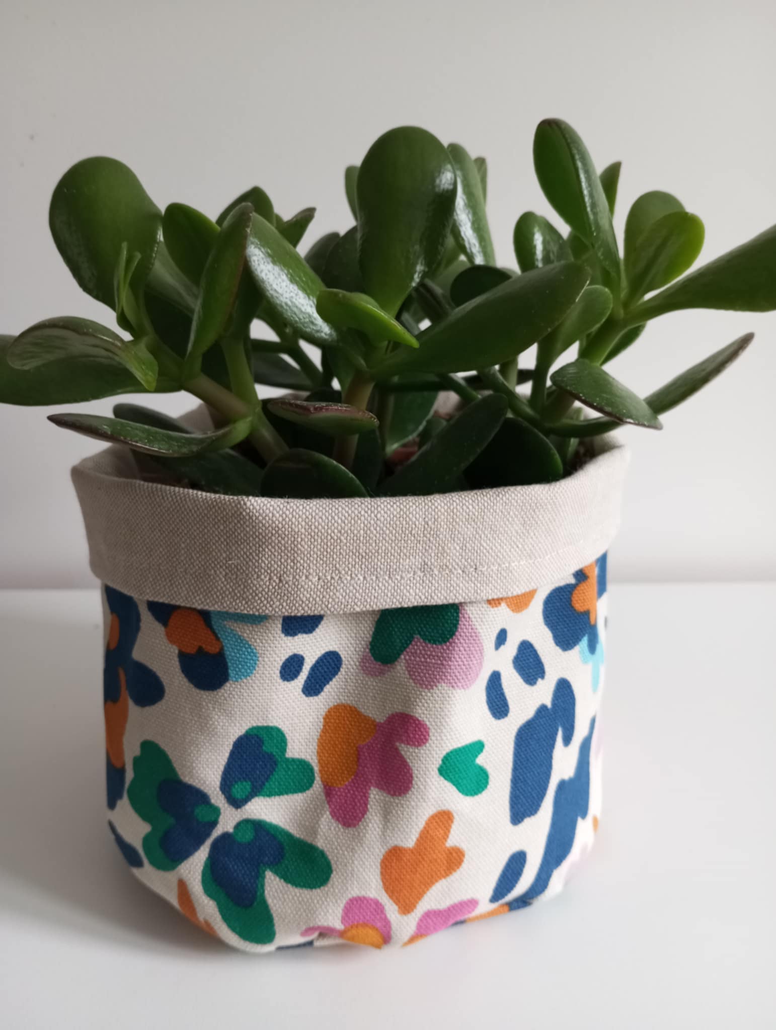 Cache-pot en tissu motif fleuri