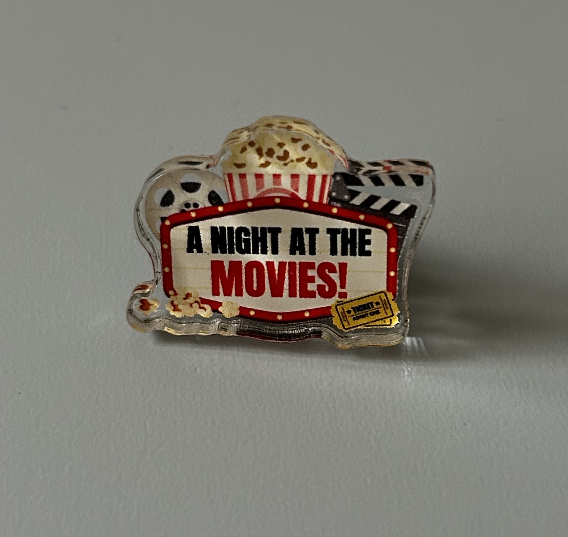 'A Night At The Movies' Show Pin