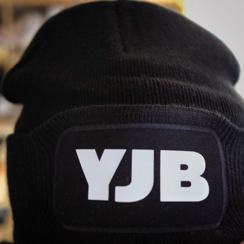YJB Beanie Monogram on a rectangular badge