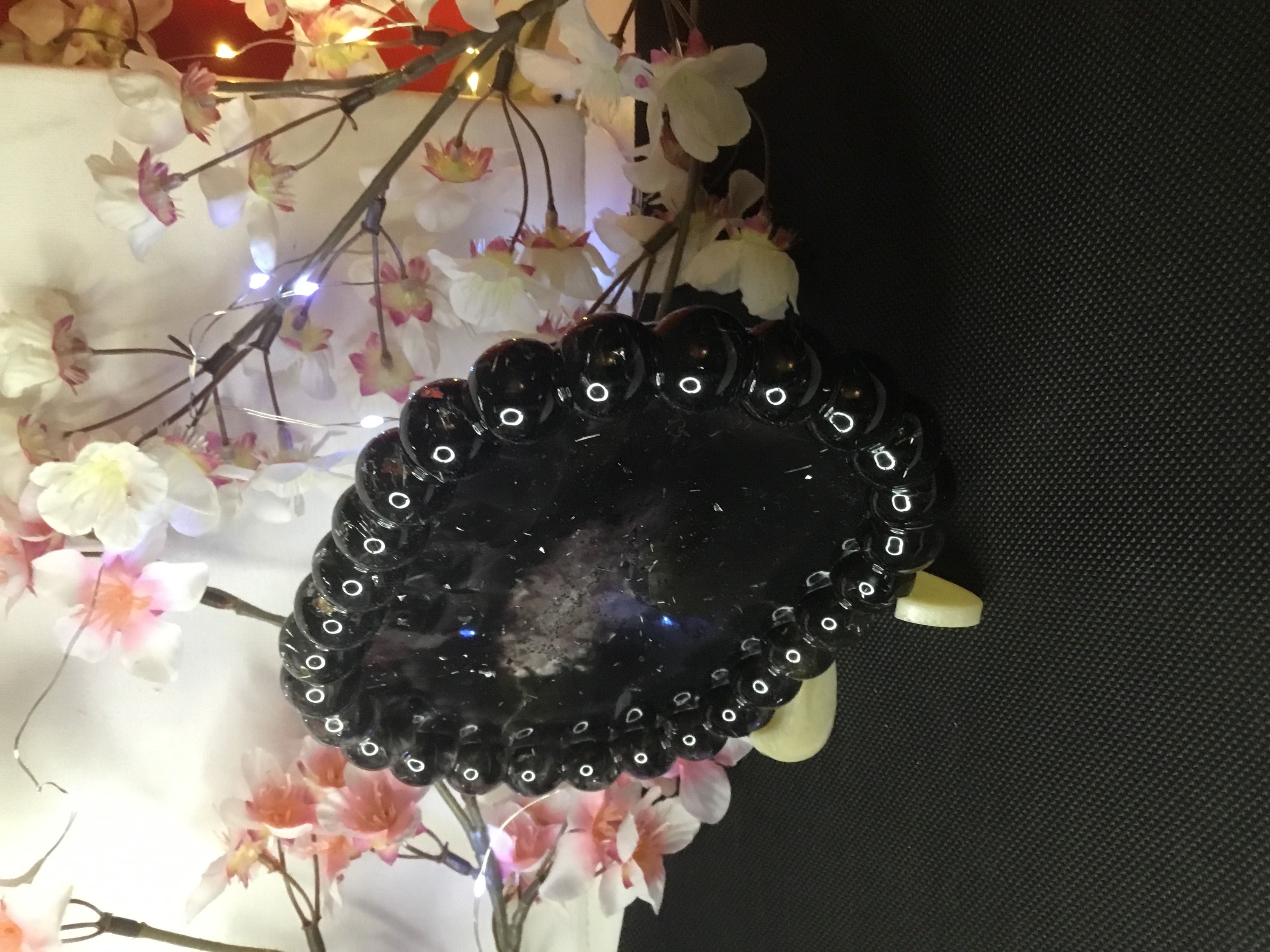 Vide poche noir et argent boule