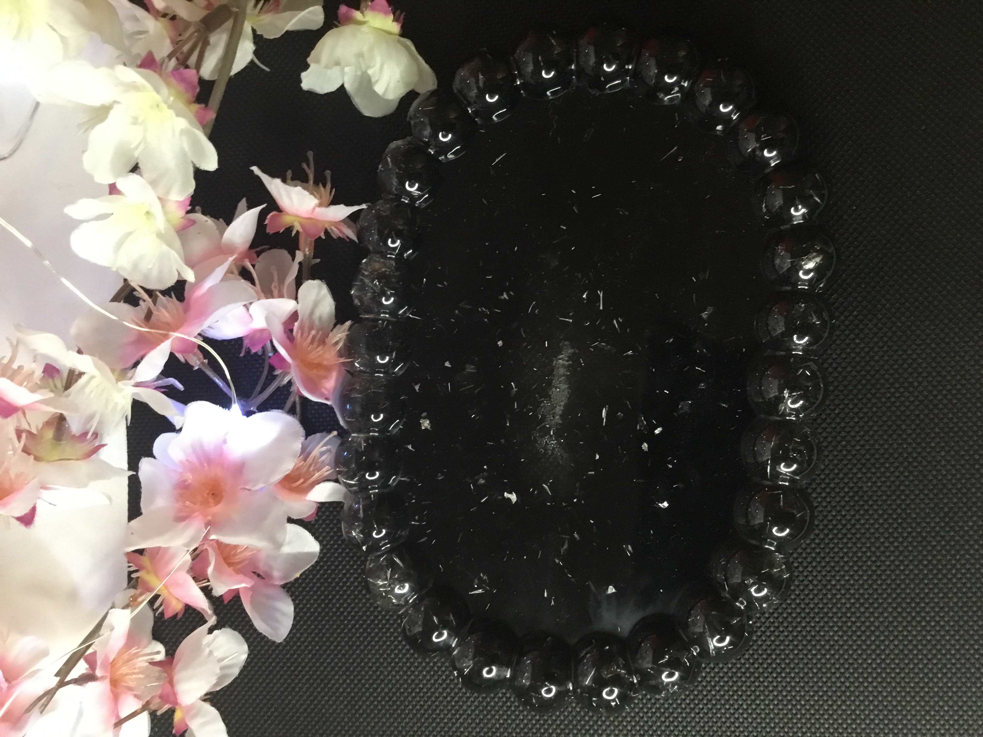 Vide poche noir et argent boule