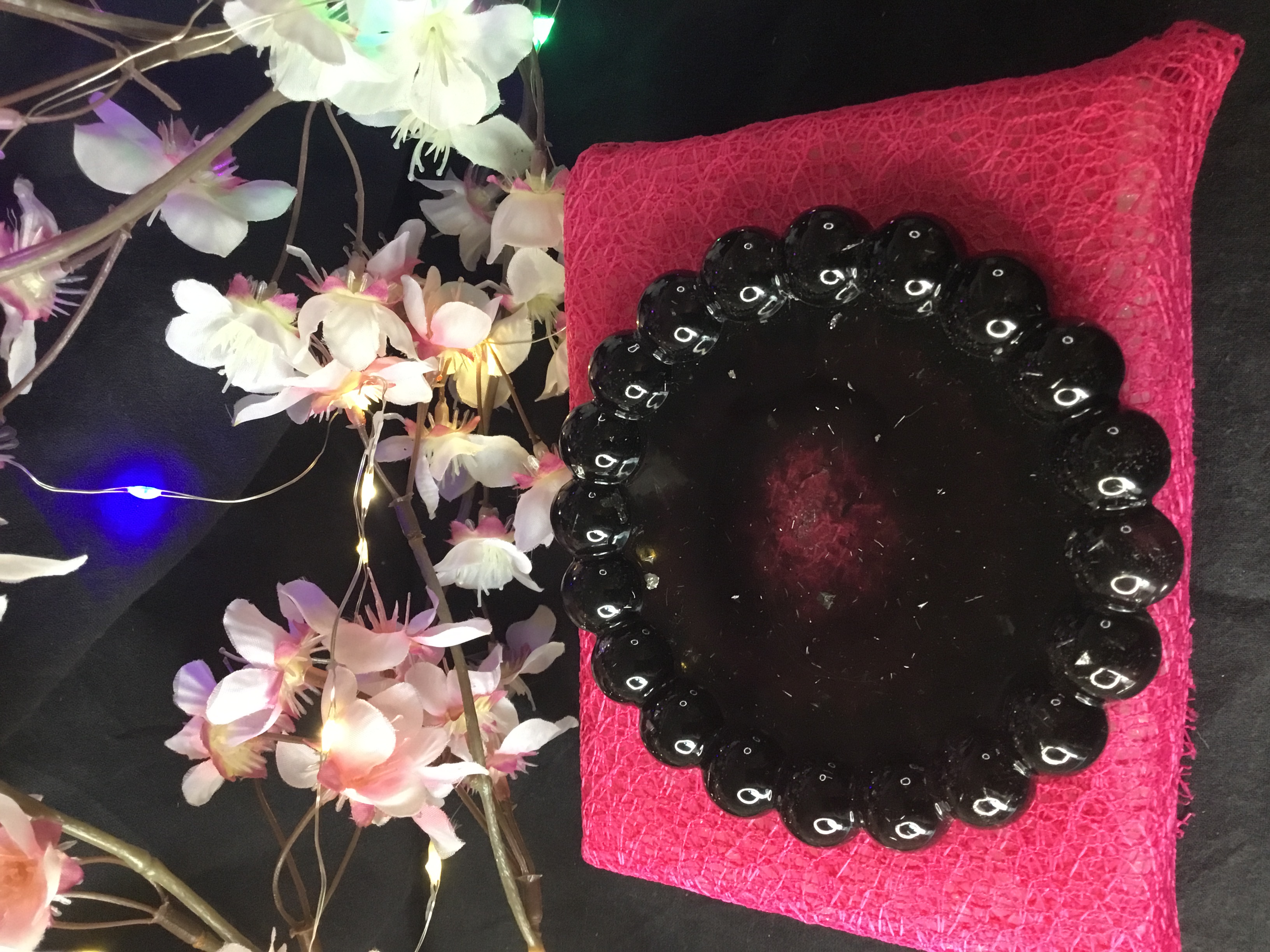 Vide poche rond noir et argent boule
