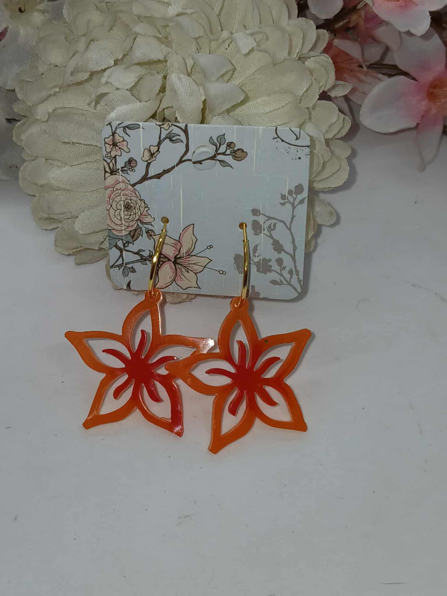 Boucles d'oreilles en forme de fleur étoilée rouge / orange
