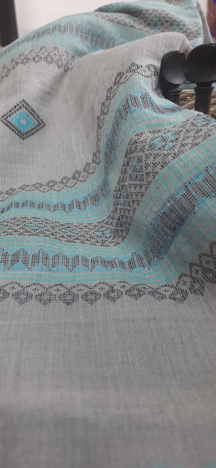 Elegance in Simplicity: Khadi Cotton Saree with Woven Design