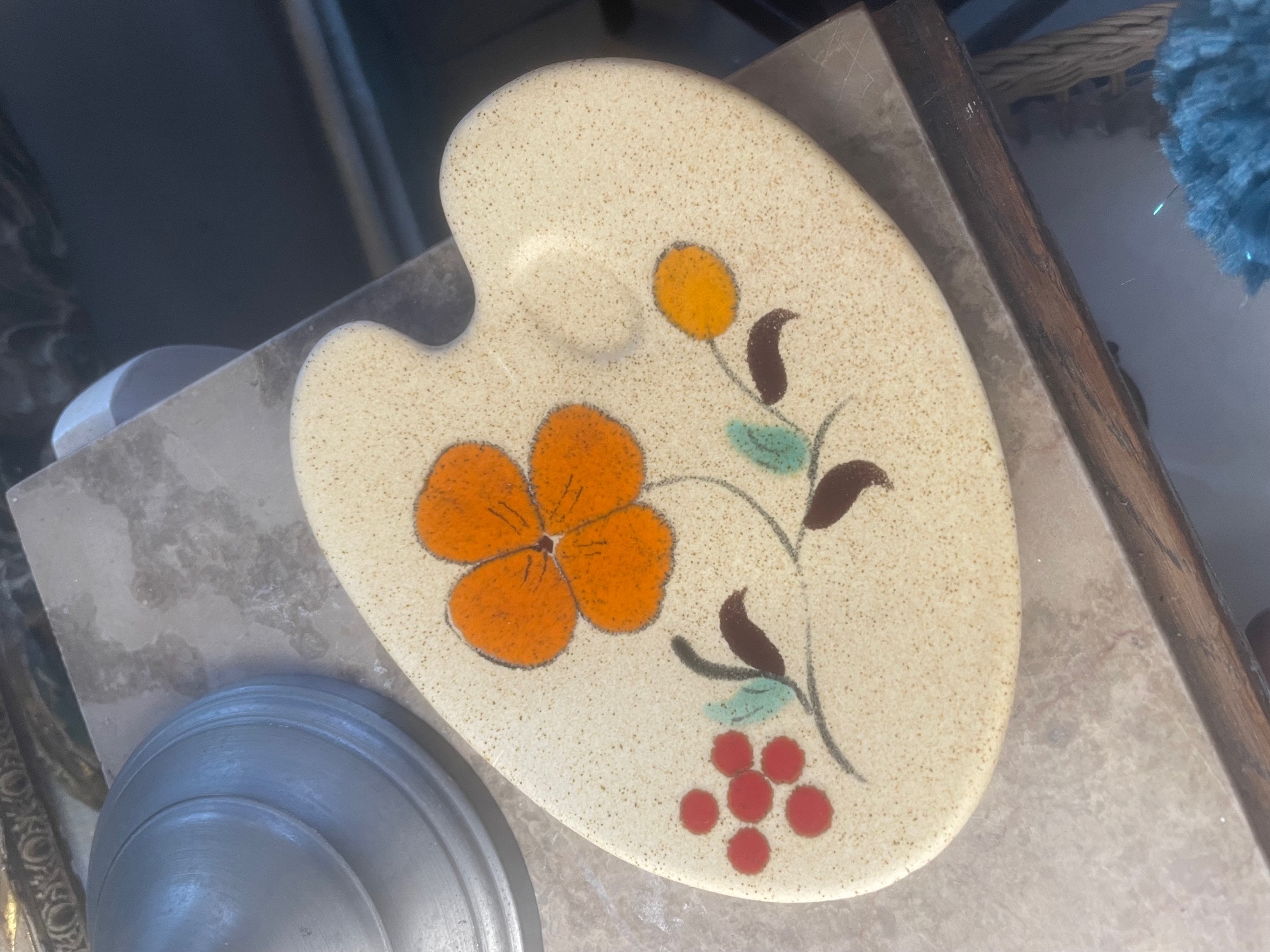 Vide poche forme palette de peinture fleur orange