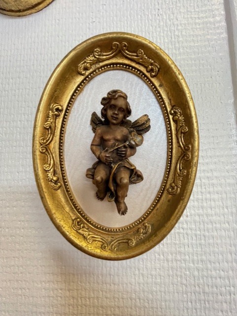 Cadre ovale ange fleur