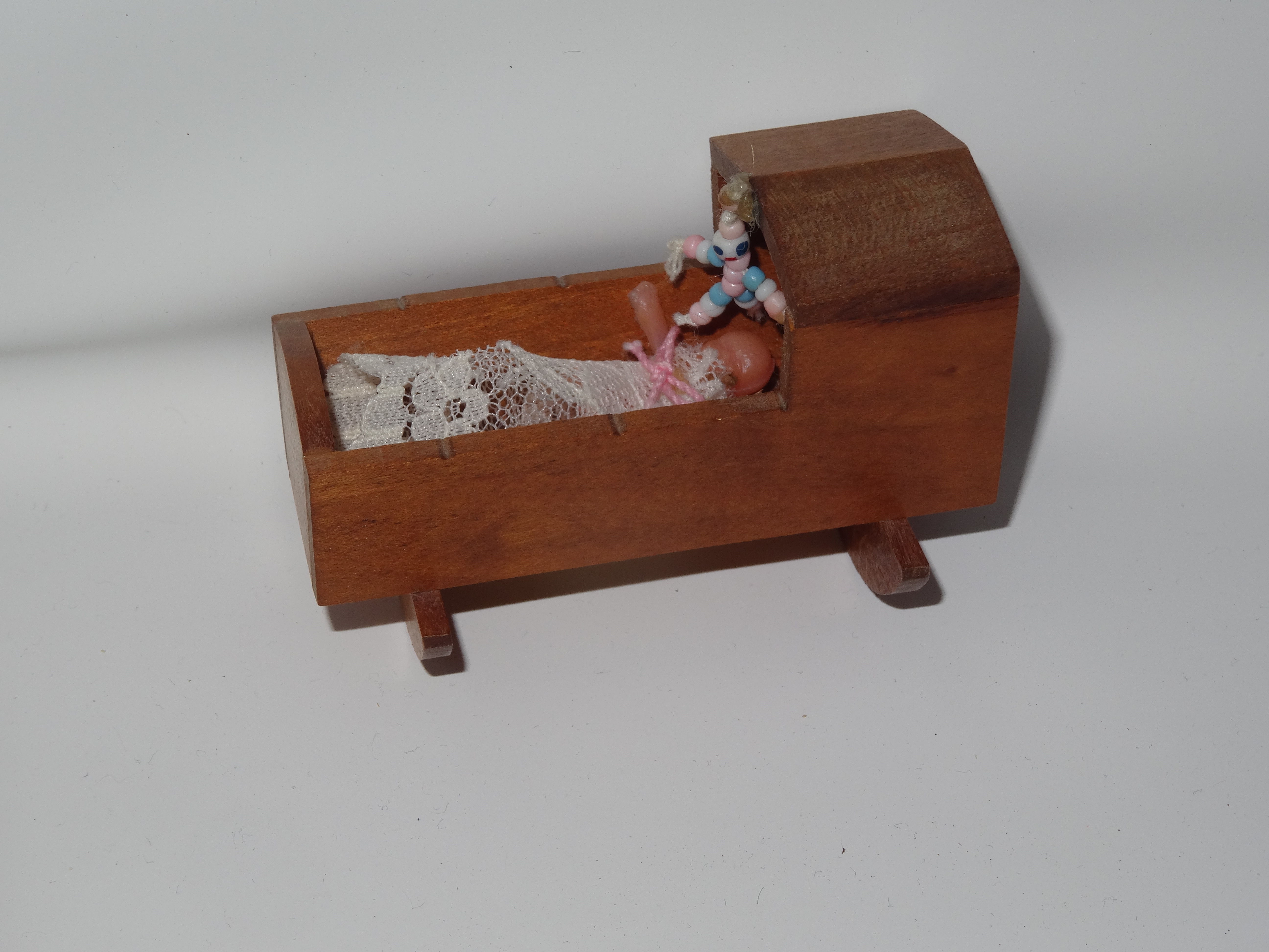 Small wooden cradle