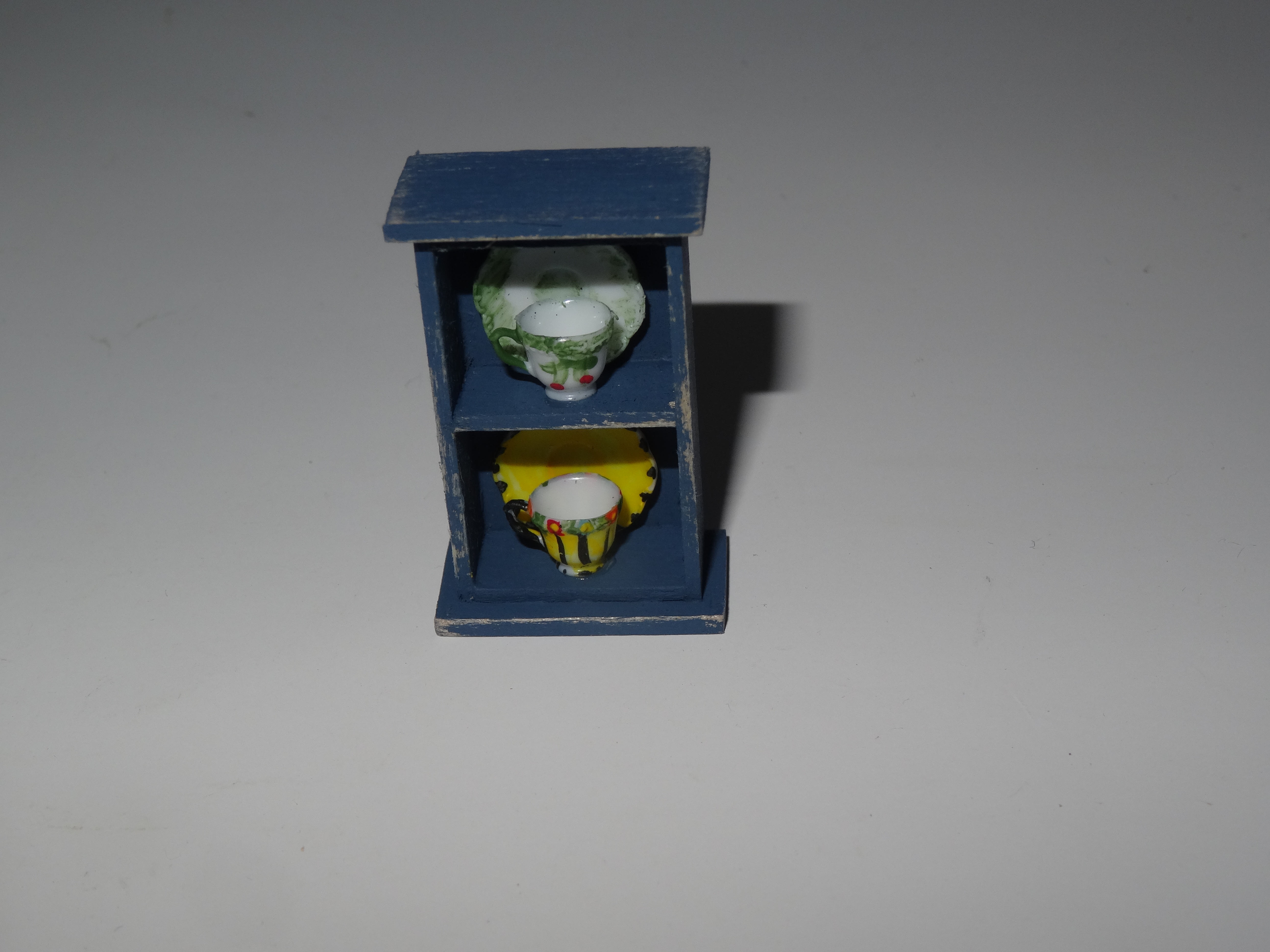 Half scale wall shelf