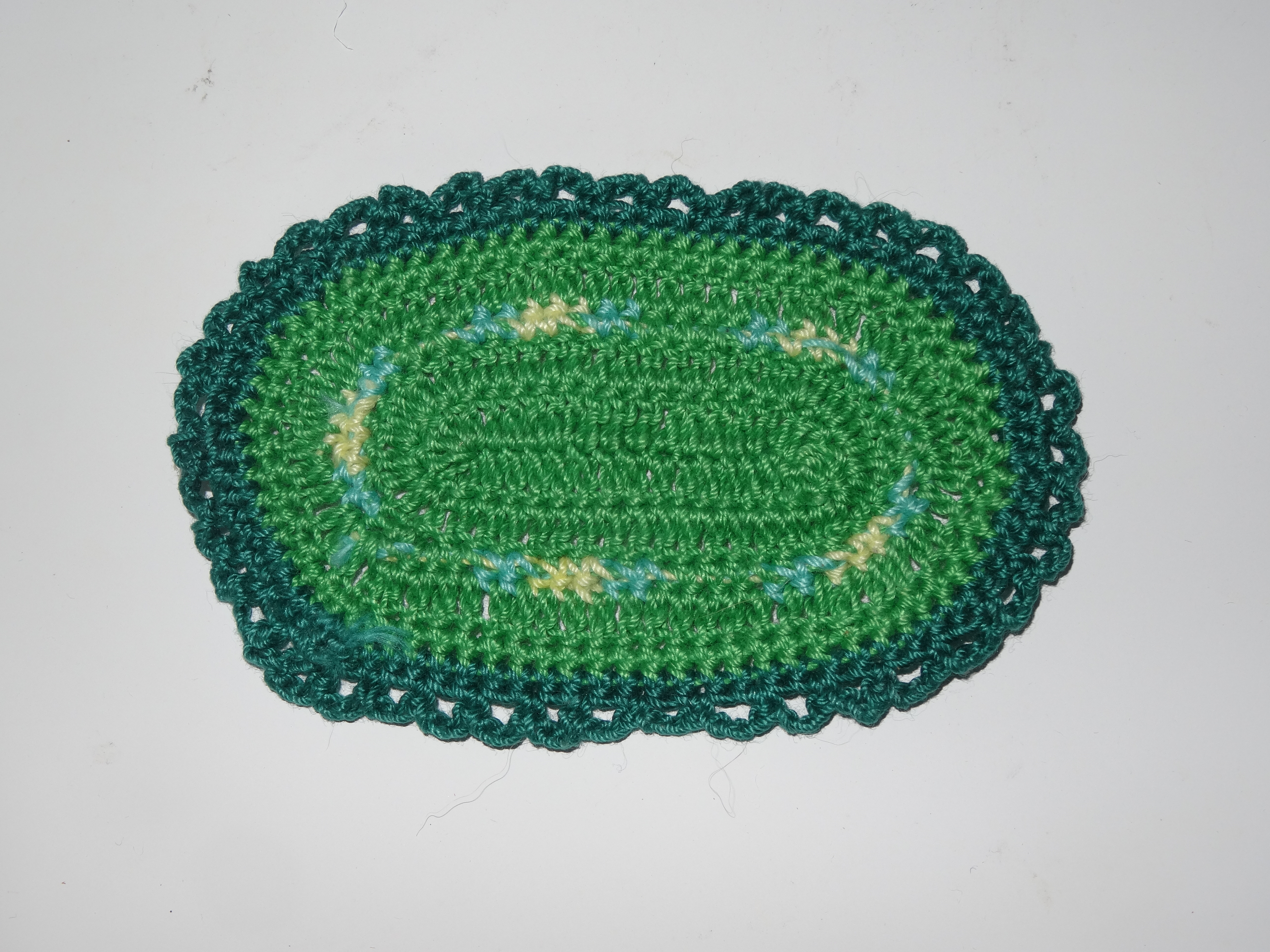 Small green rug