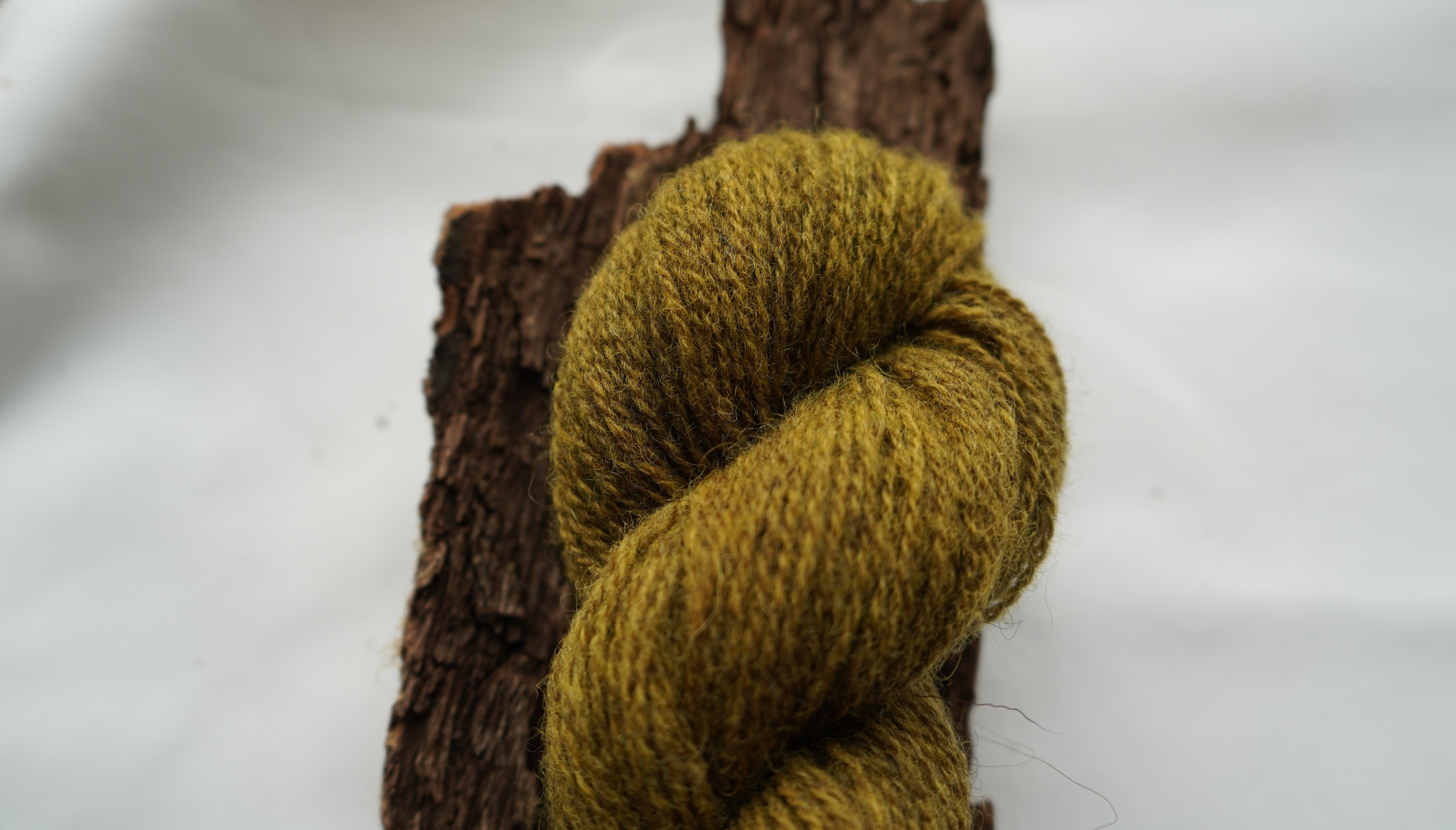 Naturally dyed wool yarn "Golden olive", 50 g 