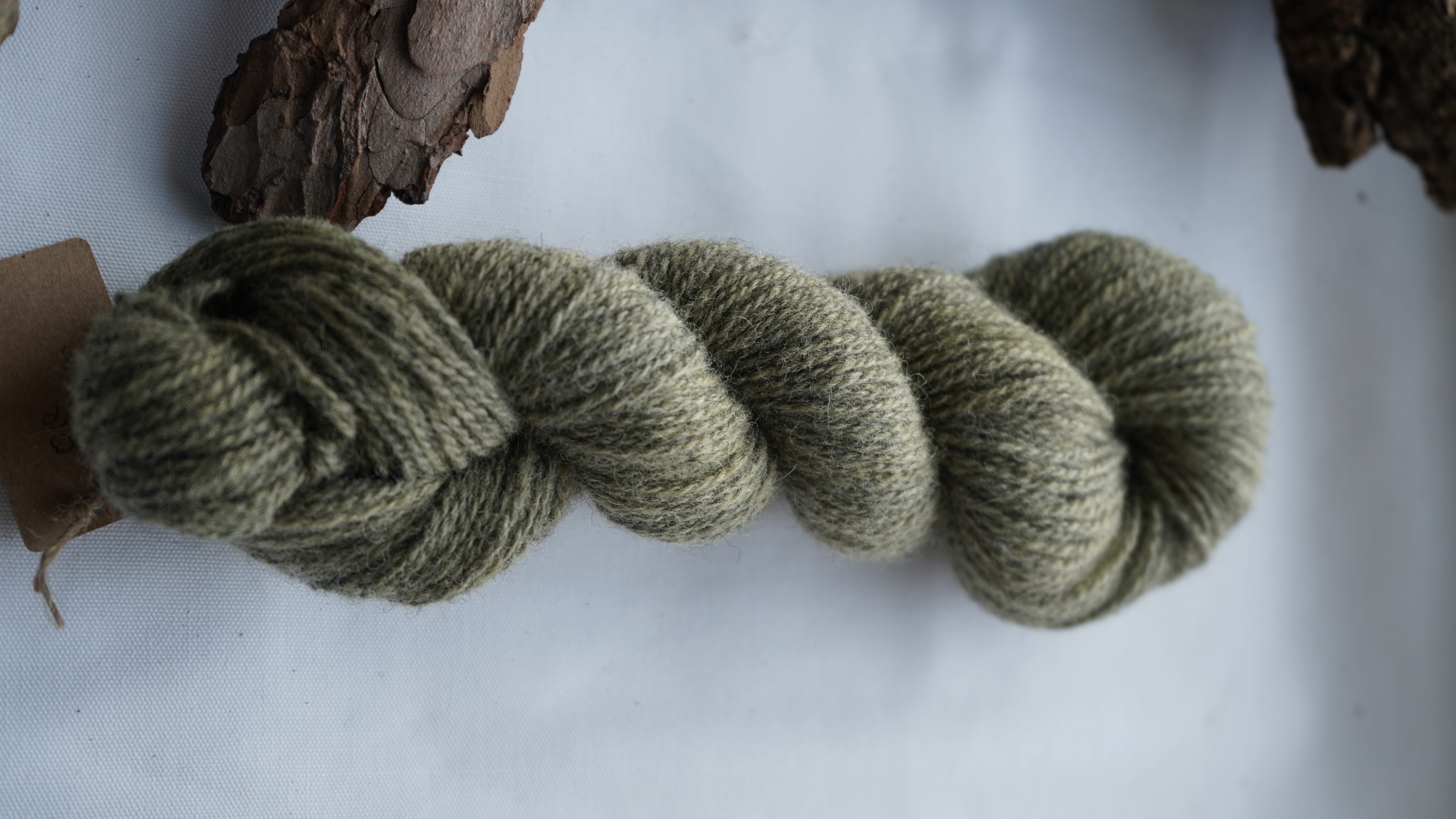Naturally dyed wool yarn "Oil green", 50 g 
