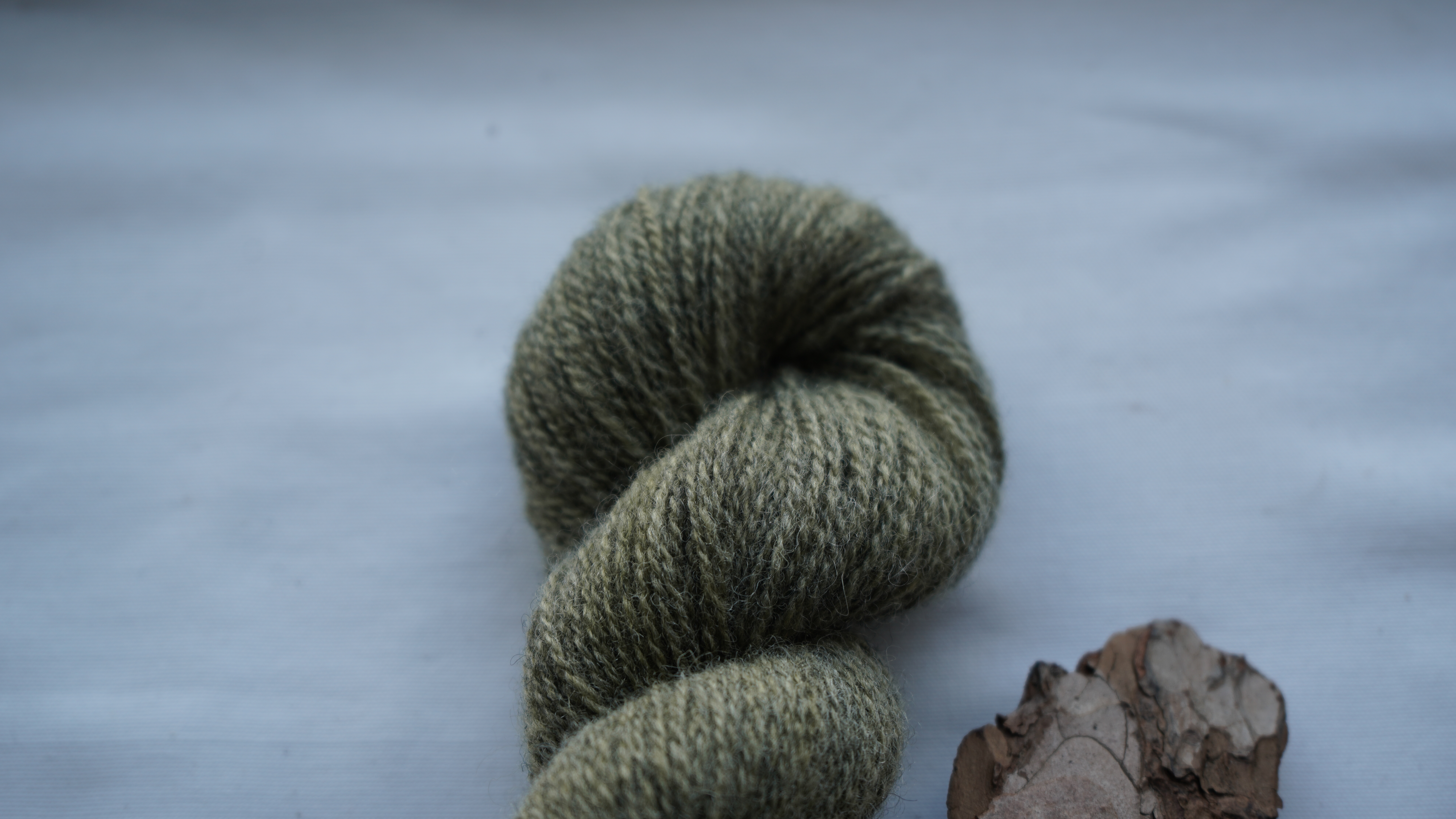 Naturally dyed wool yarn "Oil green", 50 g 