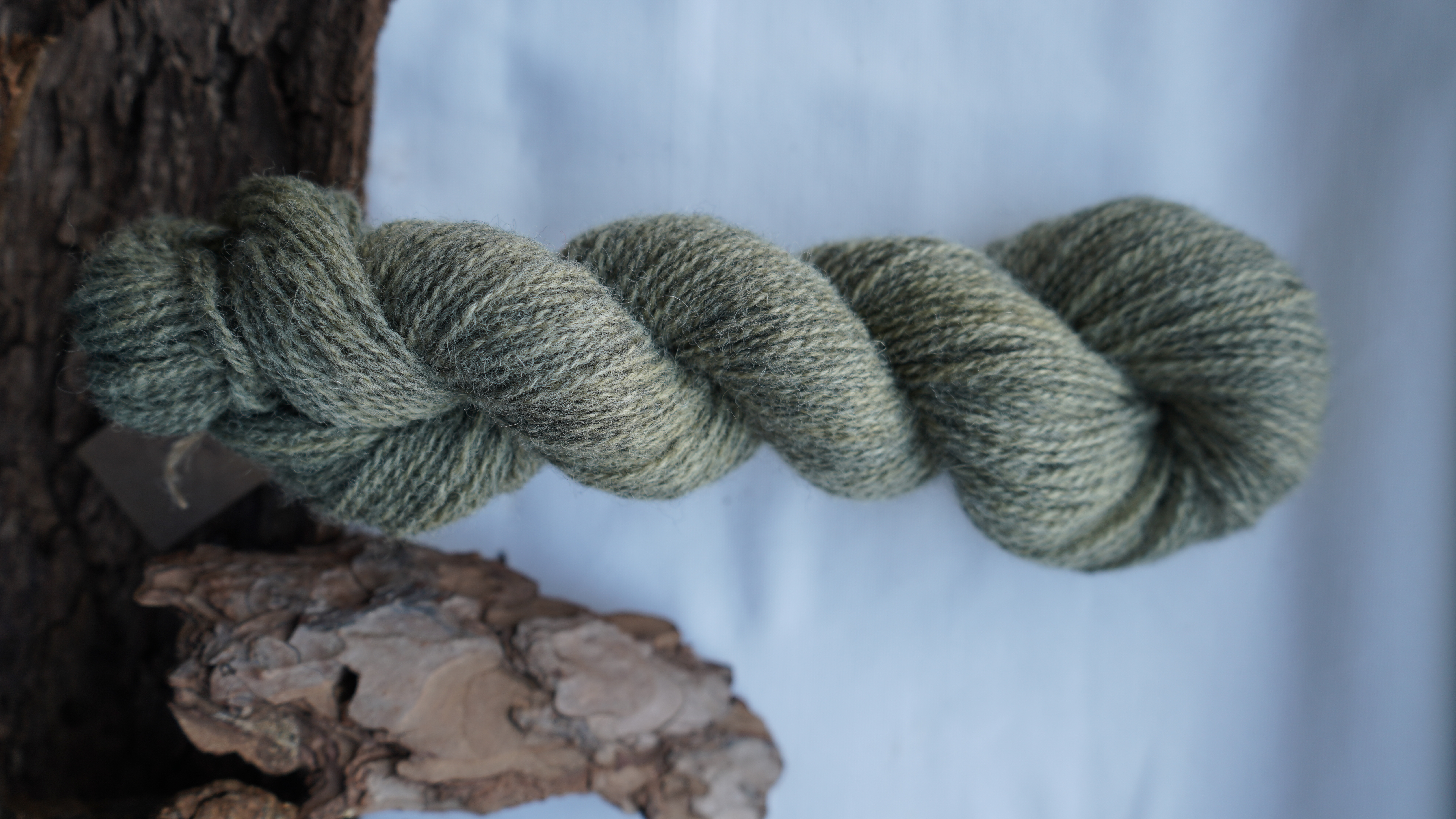 Naturally dyed wool yarn "Oil green", 50 g 