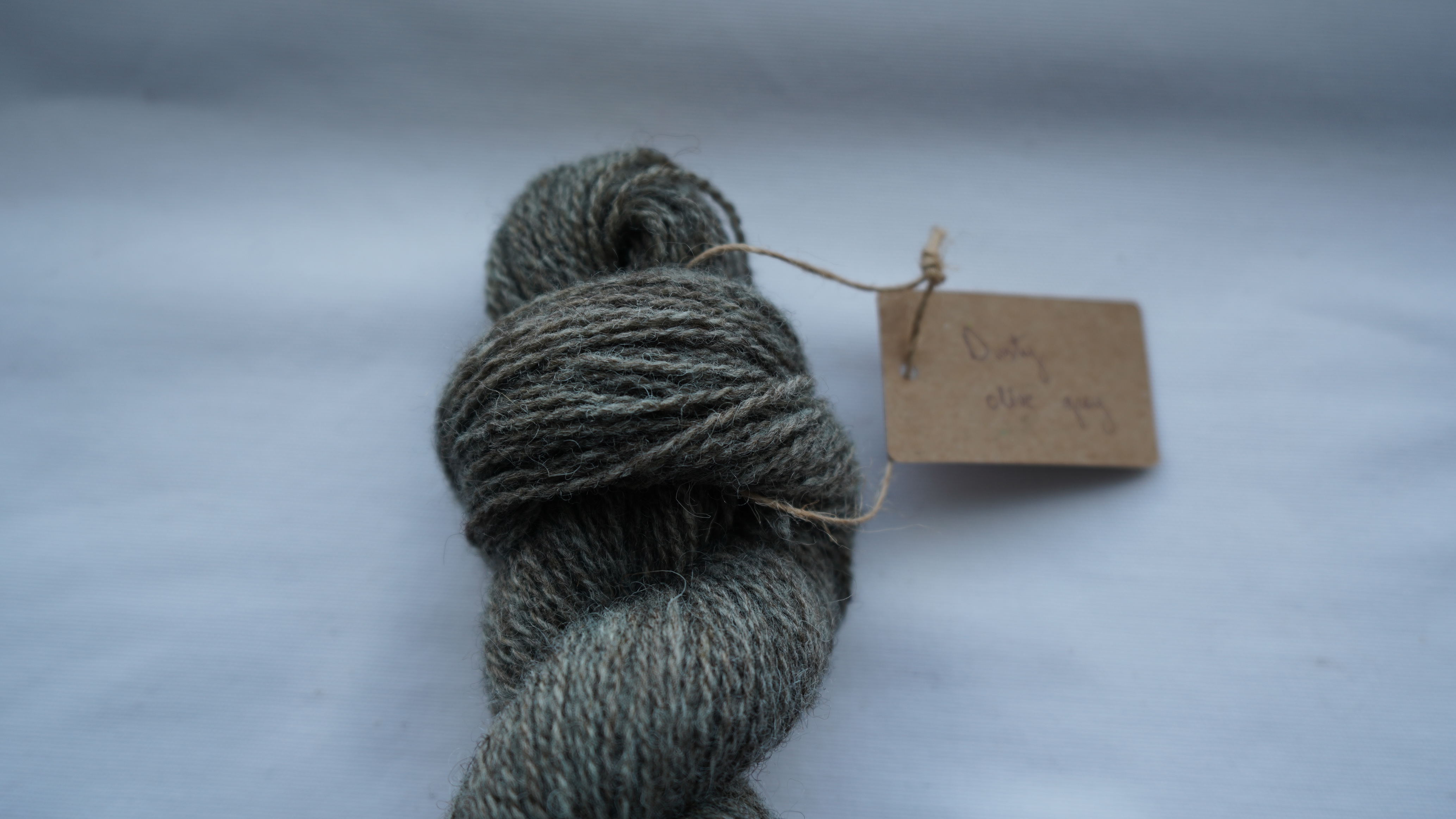 Plant dyed wool yarn "Dusty olive grey", 50 g 