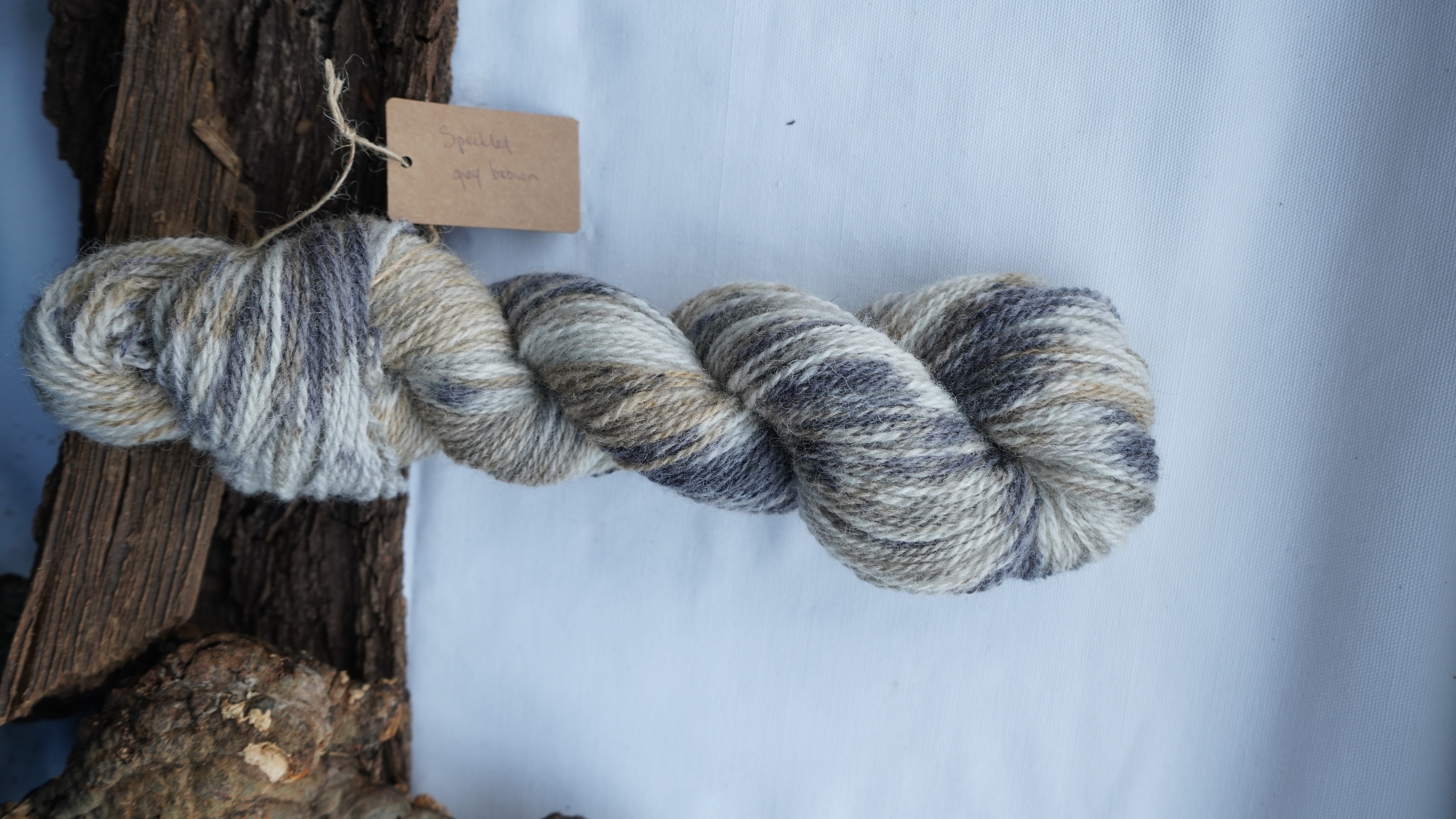 Hand-painted wool yarn "Speckled grey-brown", 50 g 