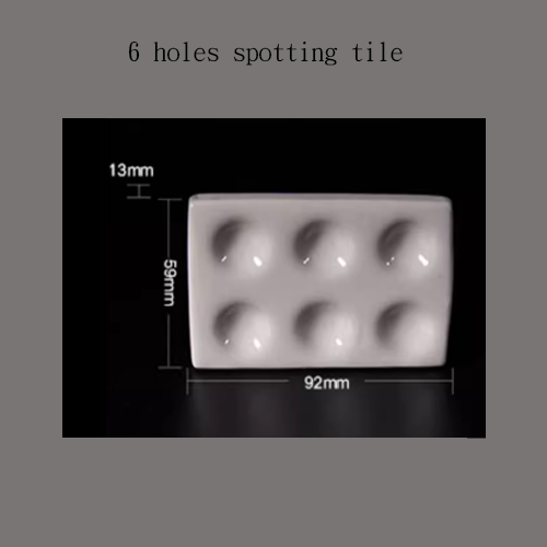 Ceramic spotting tiles
