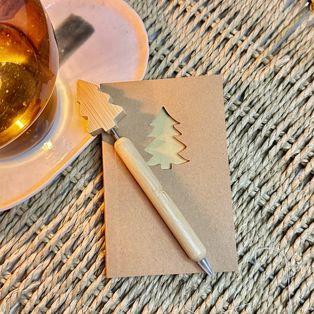 Ziemassvētku piezīmju grāmatiņas un pildspalvas komplekts