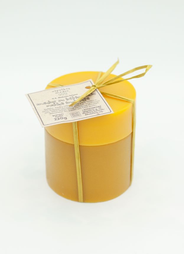 Medus su bičių pikiu vaško indelyje