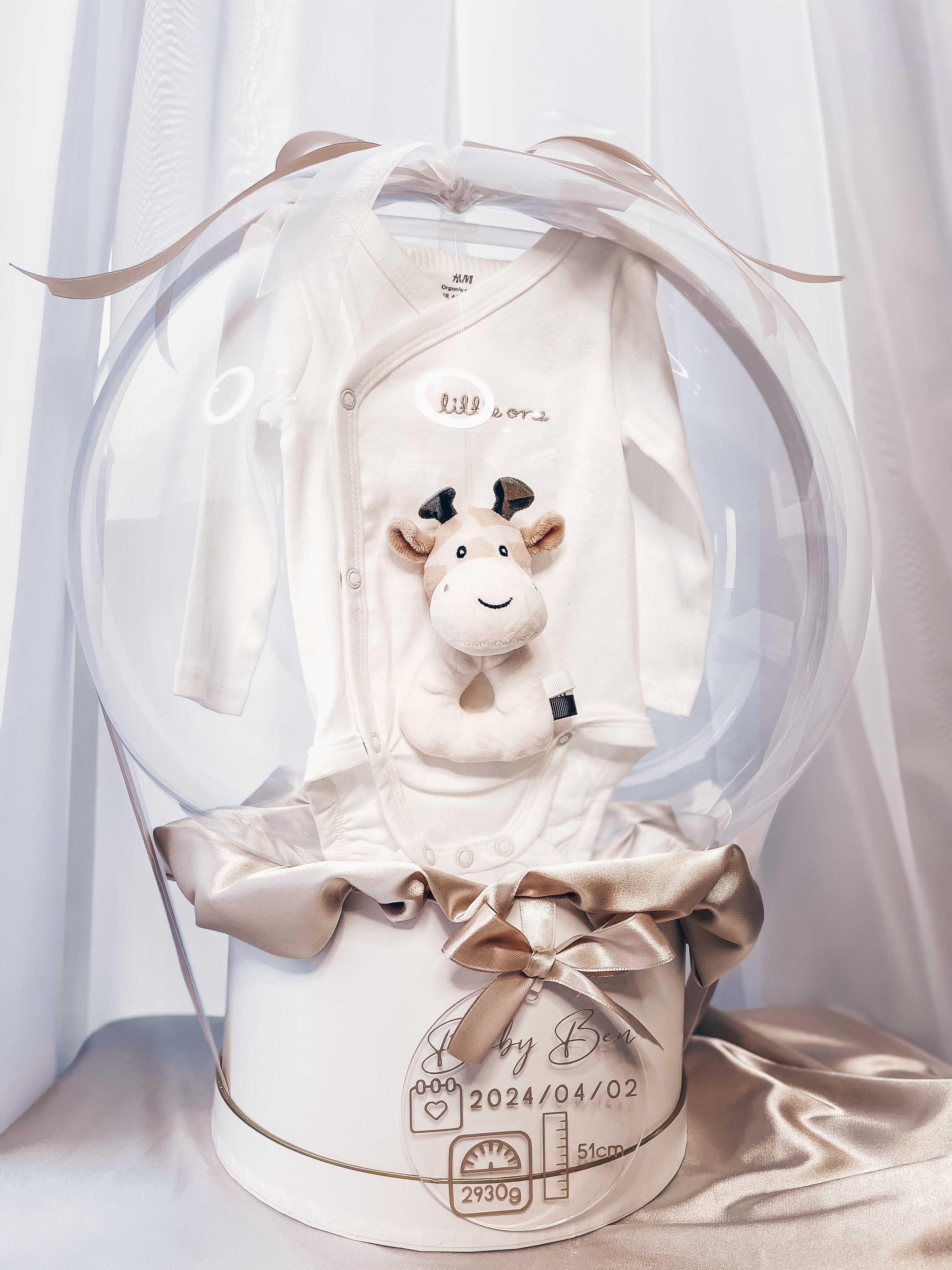 Dovana "Baltas kompletukas su barškučiu"